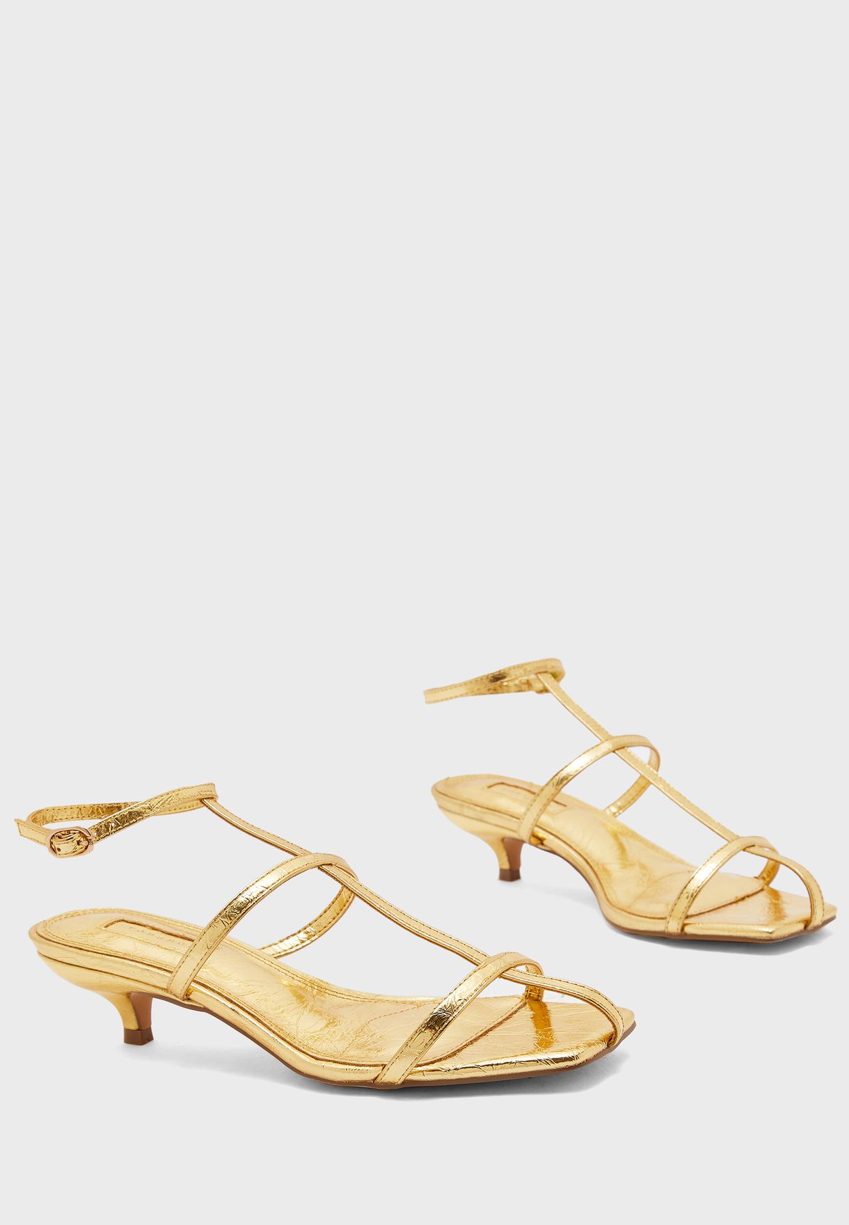 Buy > gold sandal low heel > in stock