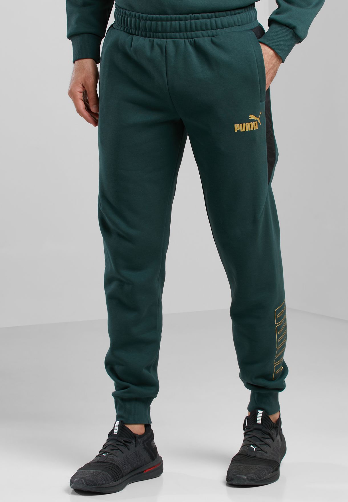 green puma sweatpants