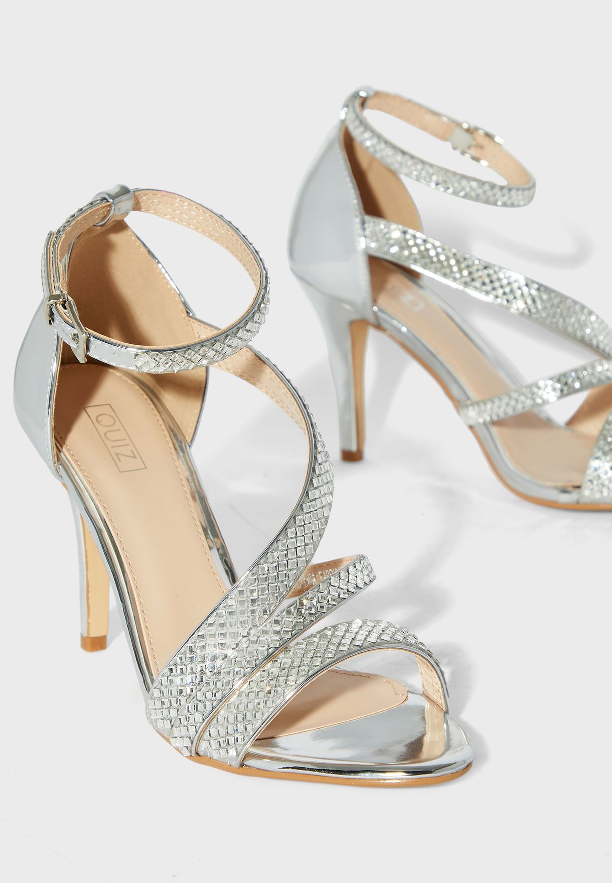 silver high heels with ankle strap