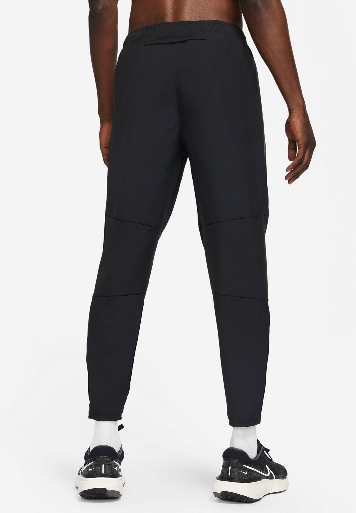 nike dri fit challenger woven pants