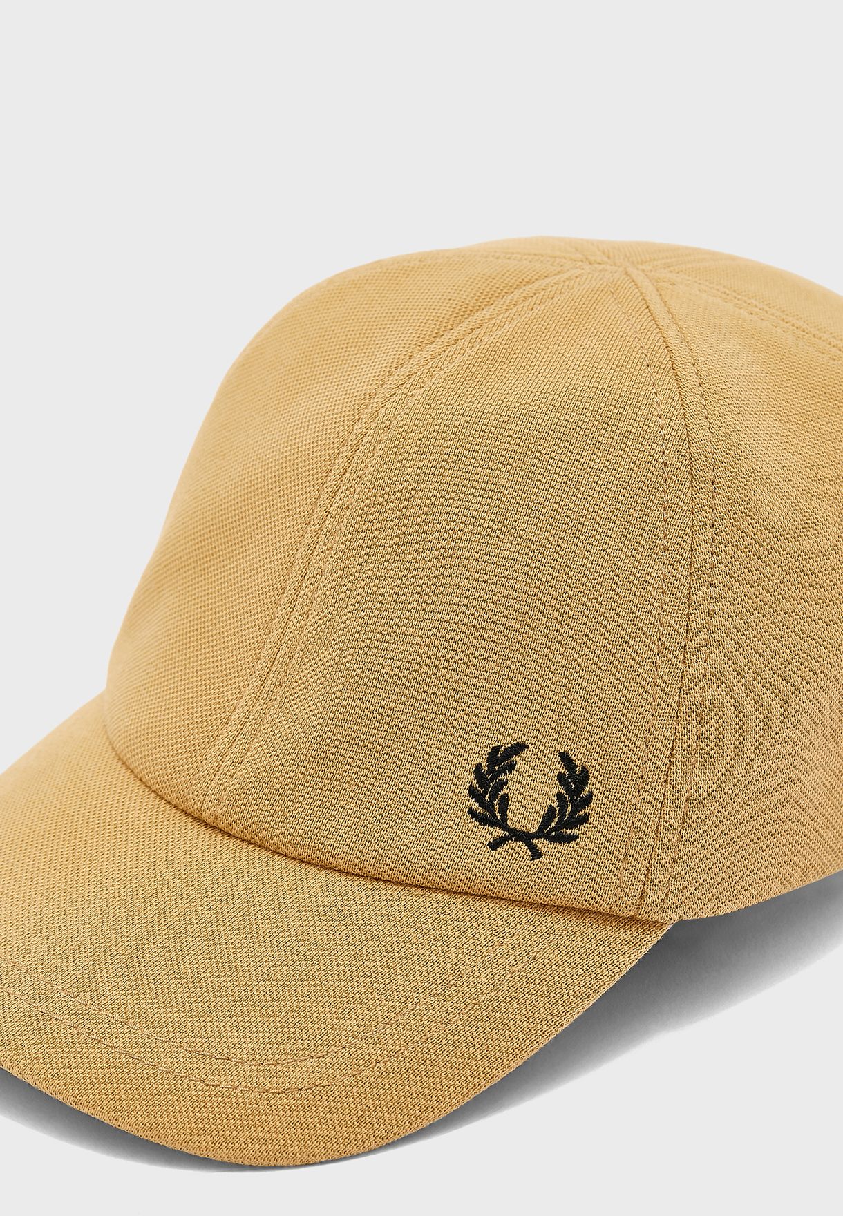 curved peak cap