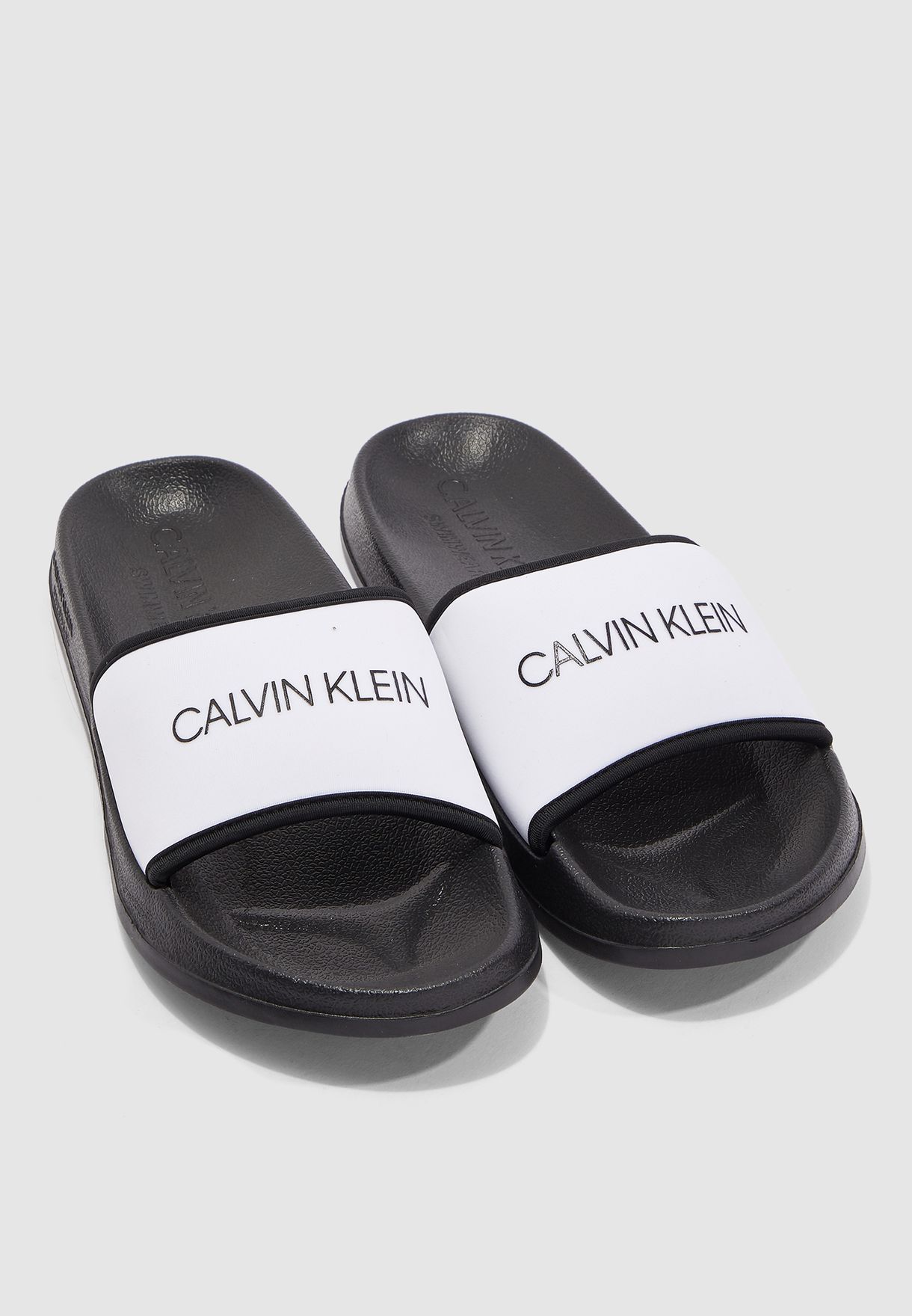 Descubrir 54+ imagen calvin klein slide sandals - Thptnganamst.edu.vn