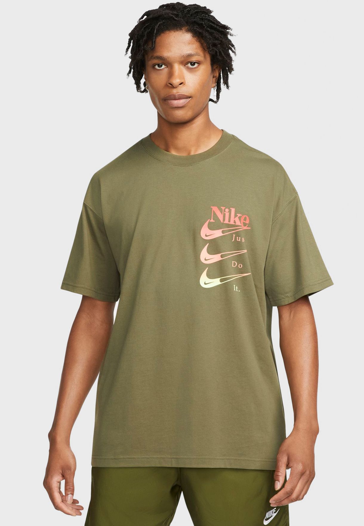 Buy Nike green Nsw Dna M90 T-Shirt for Men in Worldwide