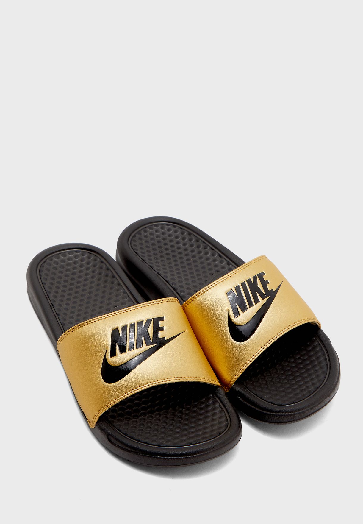 nike gold slippers