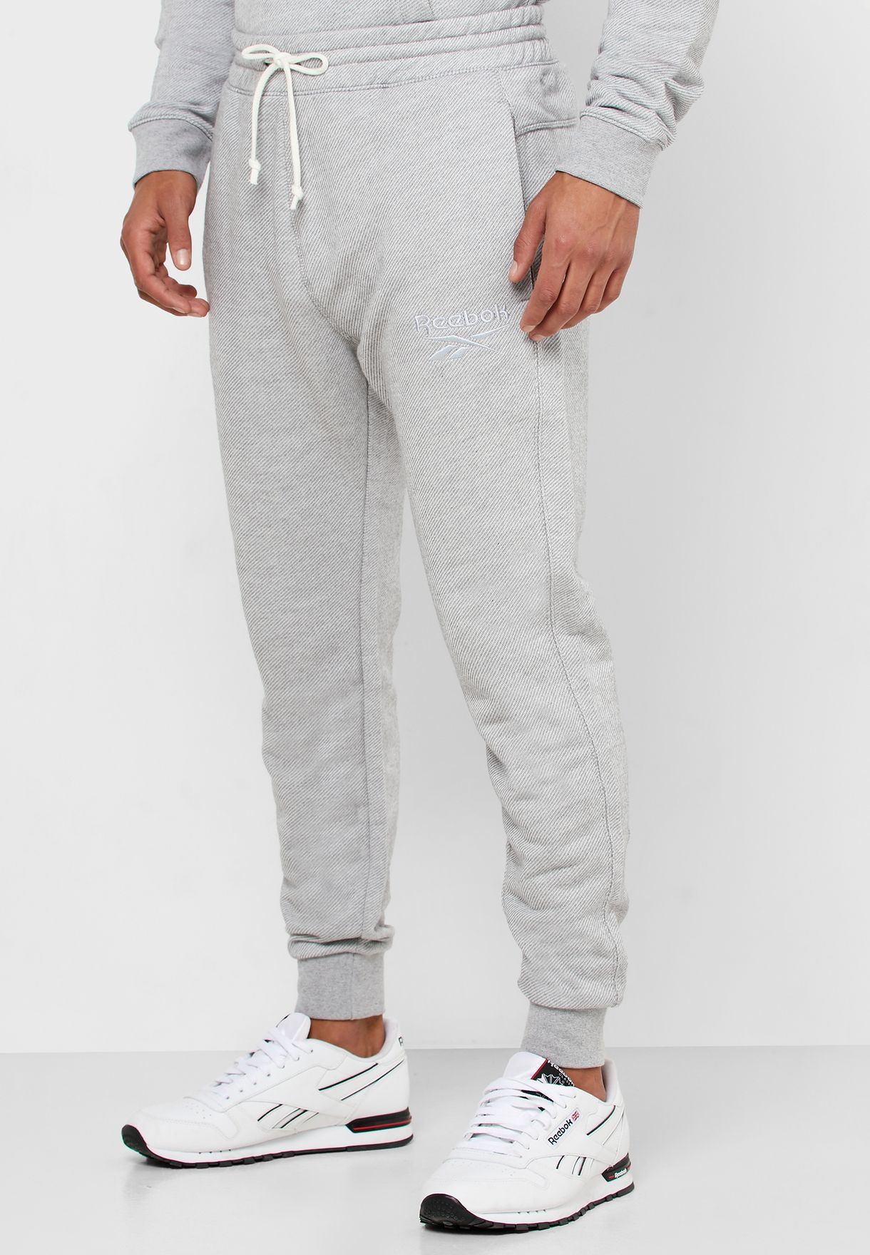 Buy Reebok grey Training Essential Melange Sweatpants for Men in Dubai ...