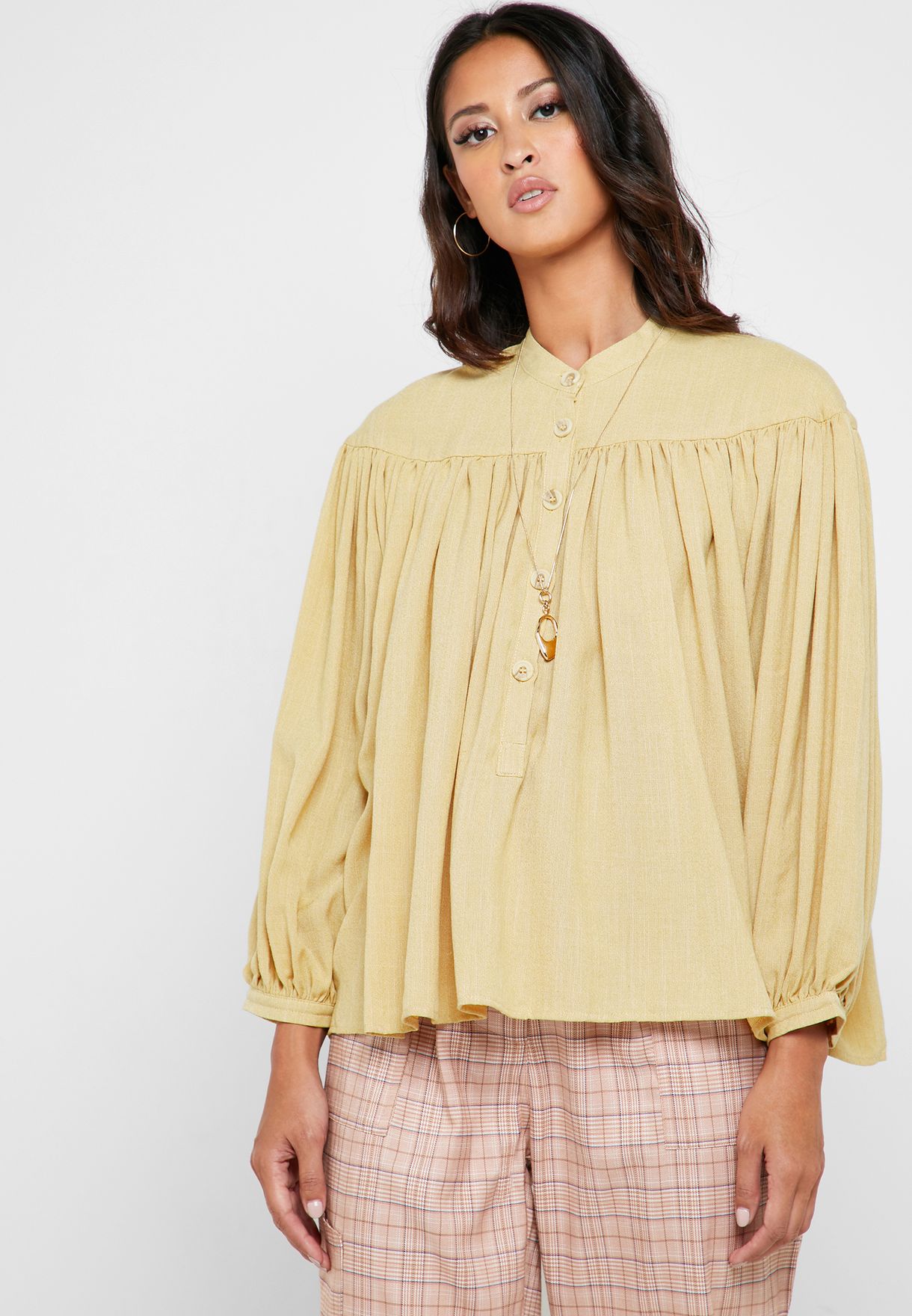 yellow pleated top