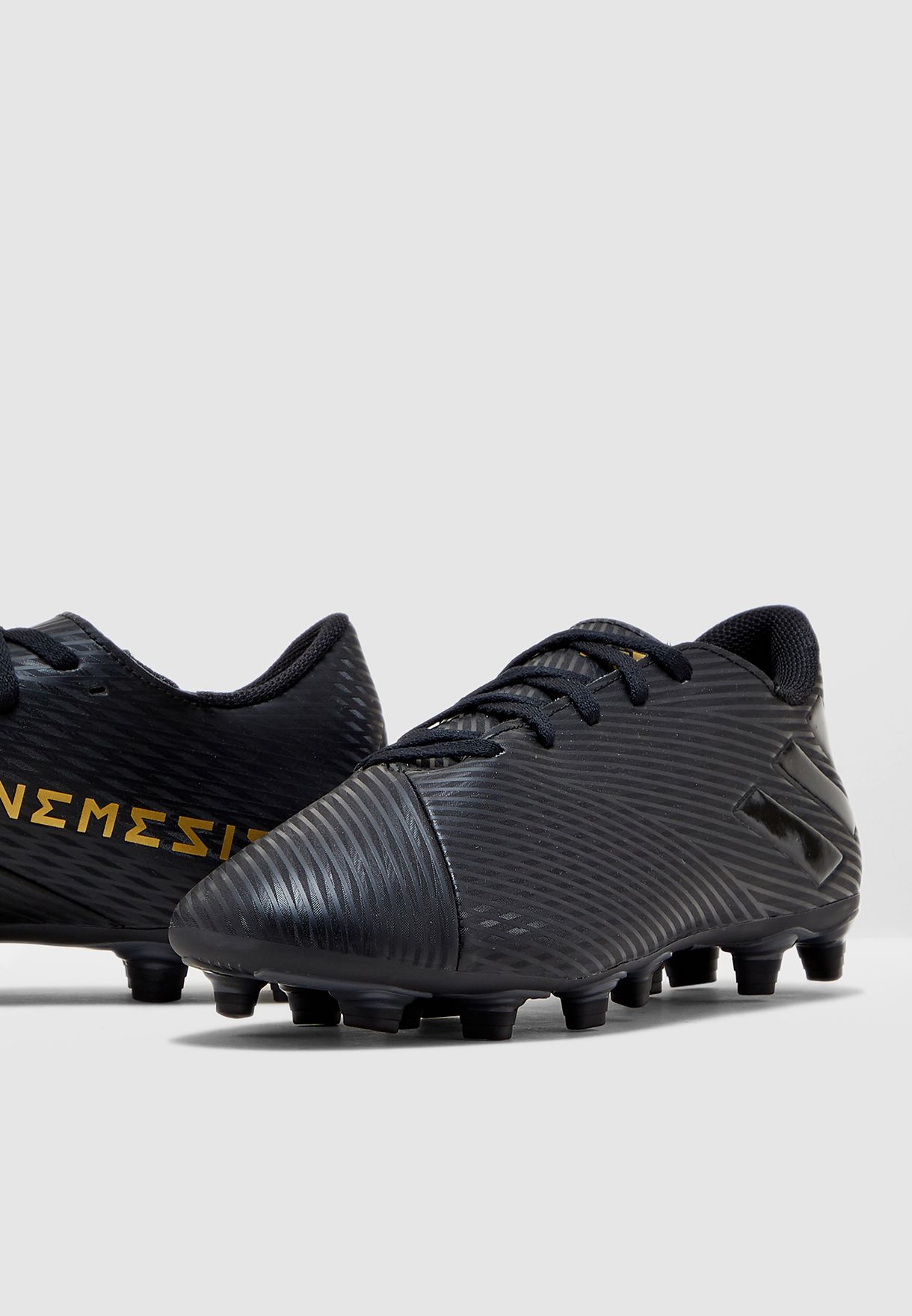 Buy adidas black Nemeziz 19.4 Football 