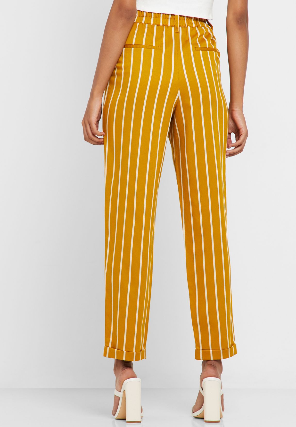 white and yellow striped pants