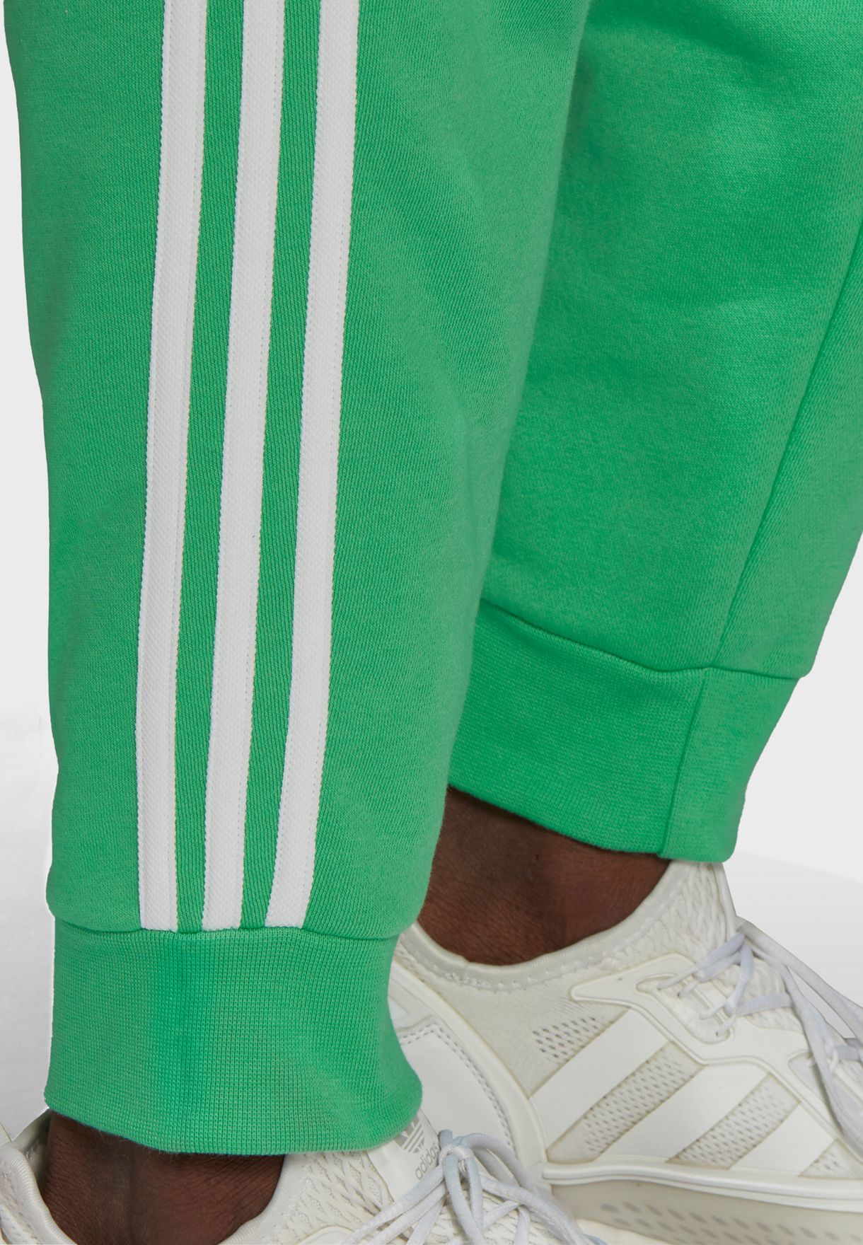 Buy adidas Originals green 3 Stripe Sweatpants for Men in MENA, Worldwide