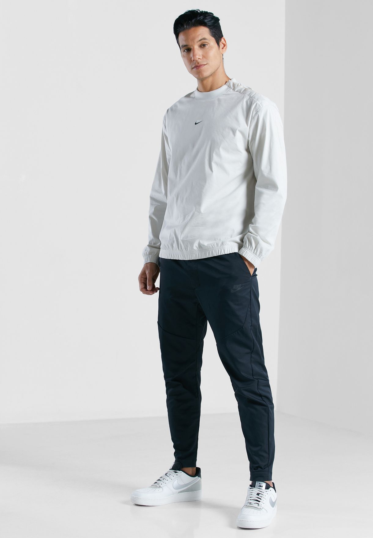 nike woven commuter trousers