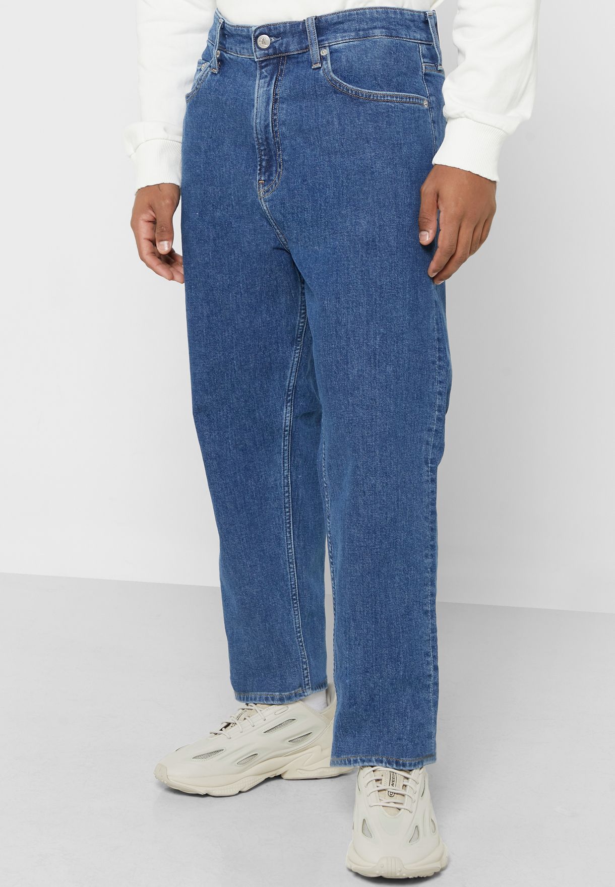 Mid Wash Tapered Fit Jeans