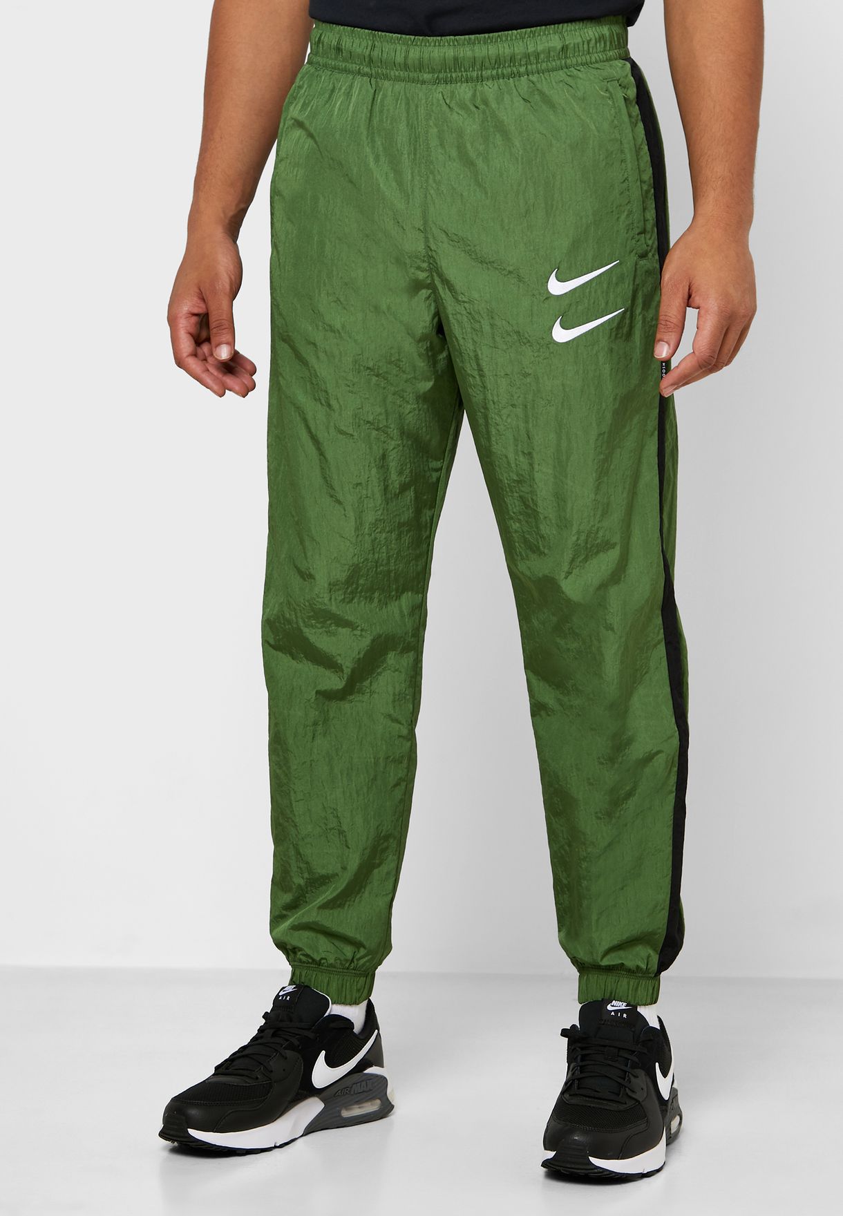 Buy Nike green NSW Swoosh Sweatpants 