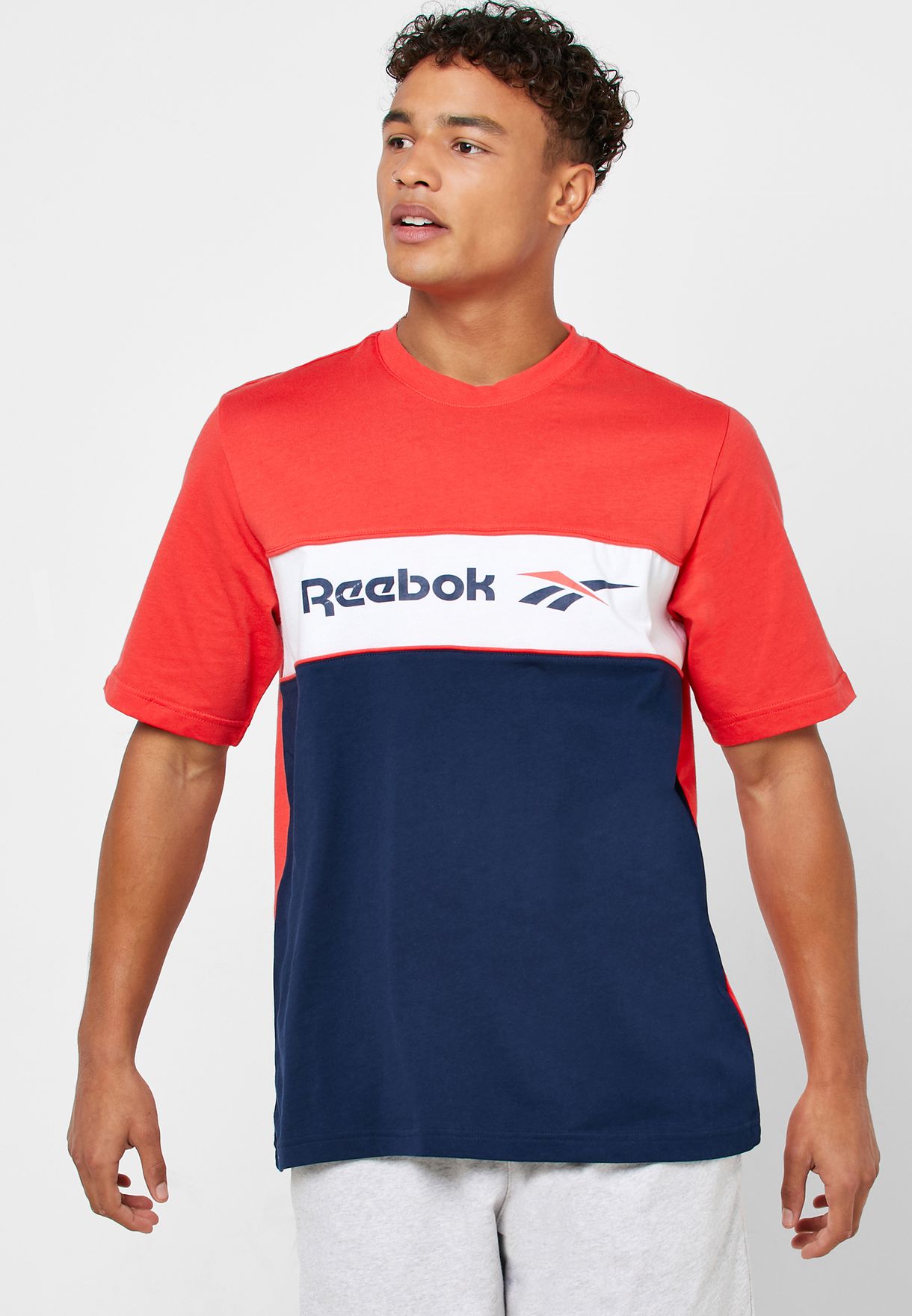 red white and blue reebok shirt