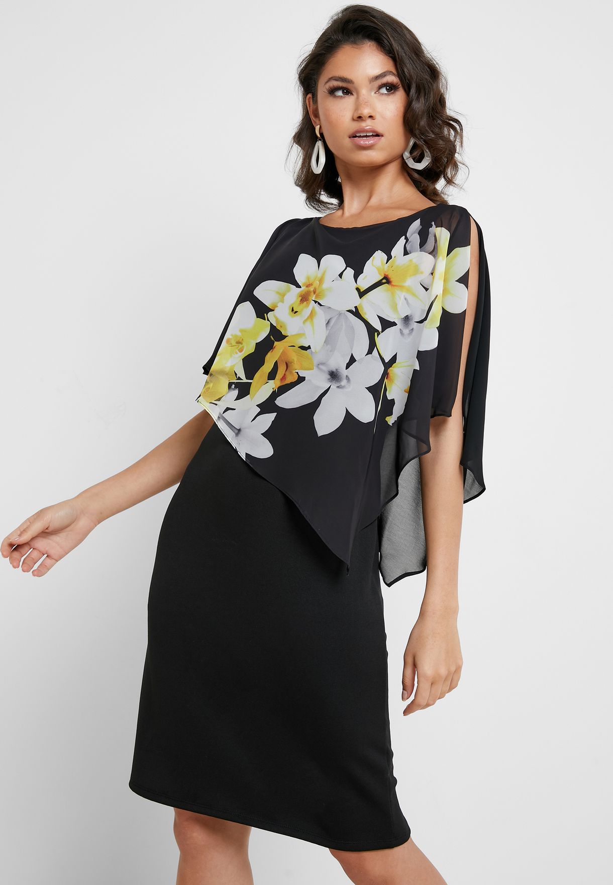 black dress with floral overlay