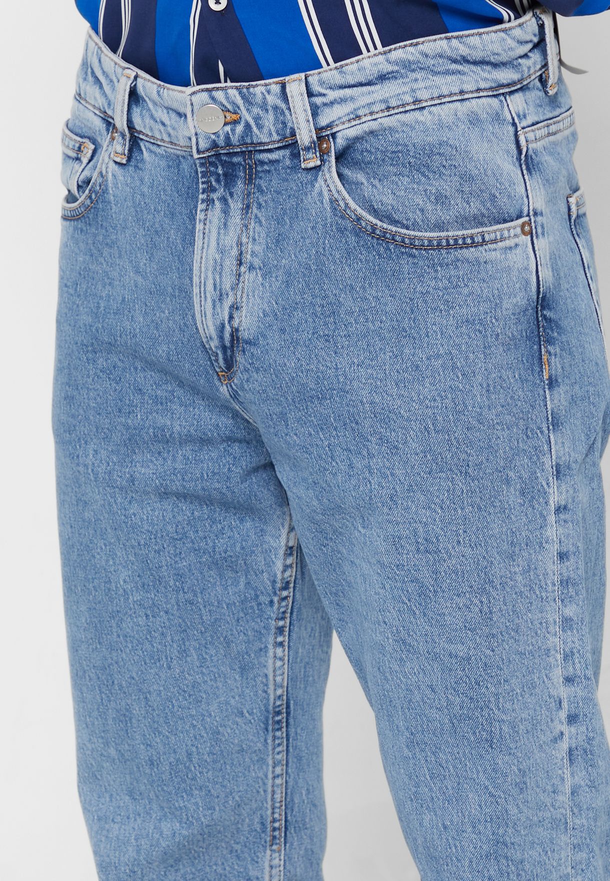 Mid Wash Tapered Fit Jeans