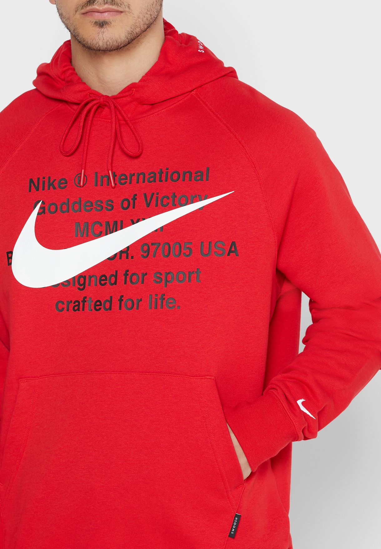red nike hoodie with swoosh all over