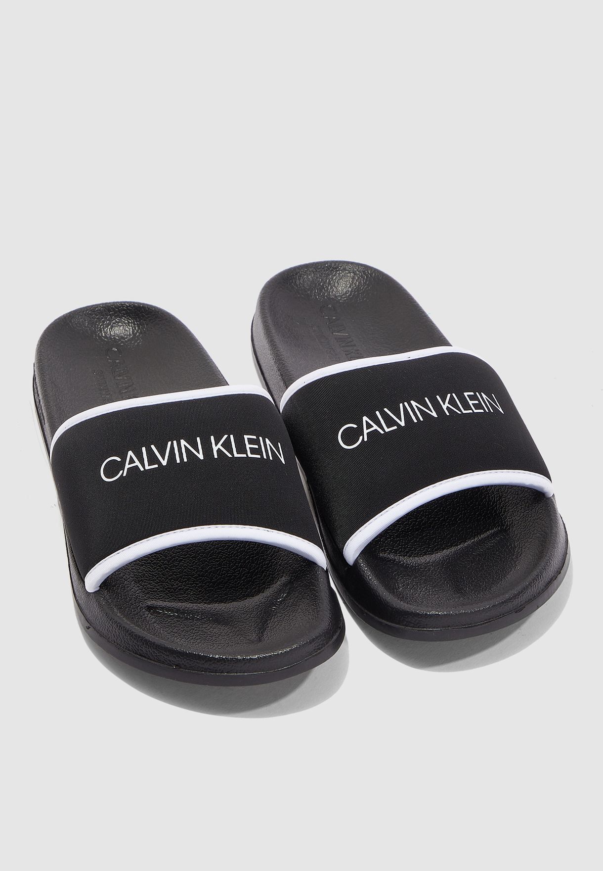 Buy Calvin Klein black CK Slide Sandal for Women in Riyadh, Jeddah