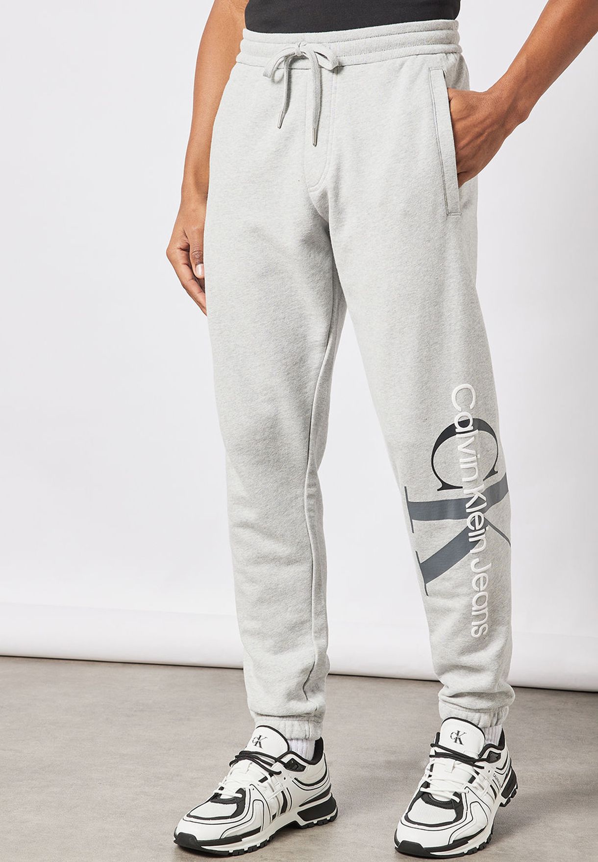 Buy Calvin Klein Jeans grey Essential Tracksuit Pants for Men in Dubai, Abu  Dhabi