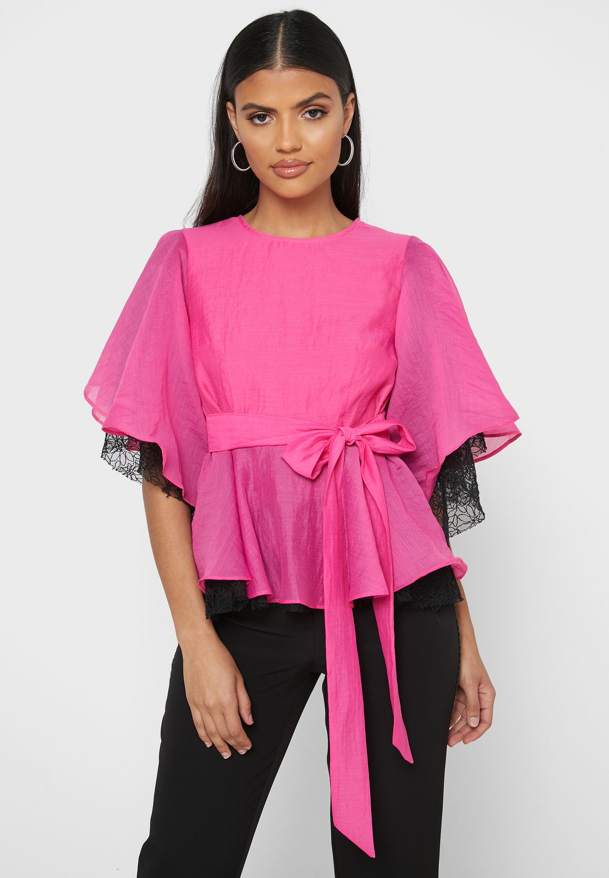 pink top with ruffle sleeves