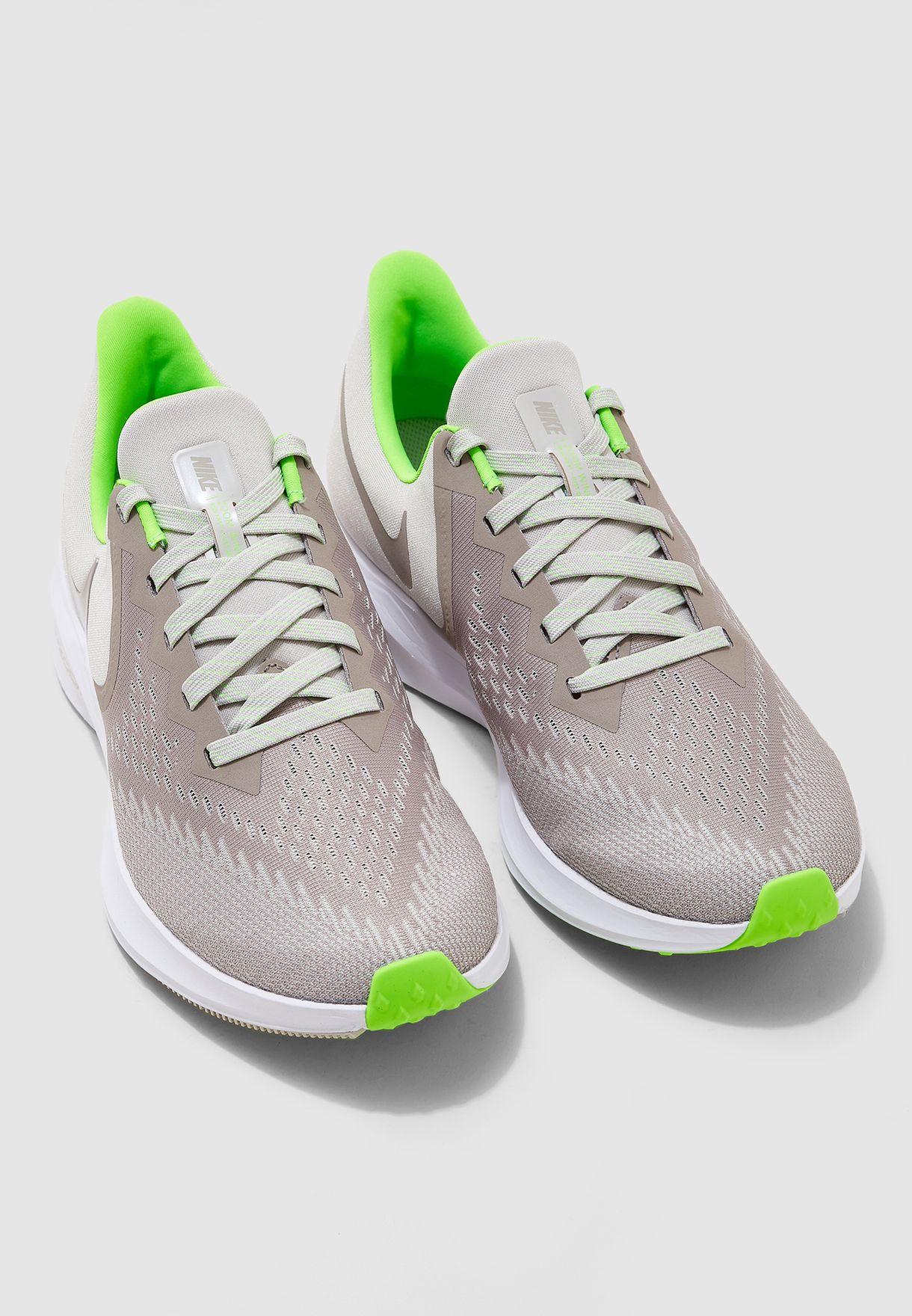 nike grey and green shoes