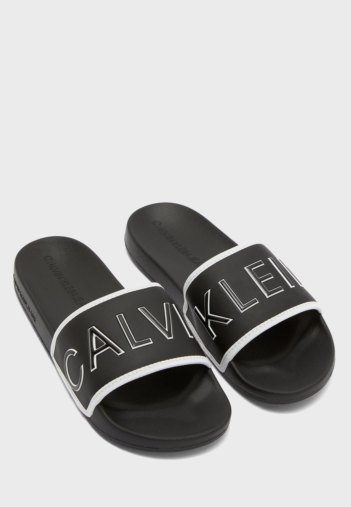 Buy Calvin Klein black Slide Padded Flip Flops for Men in MENA, Worldwide