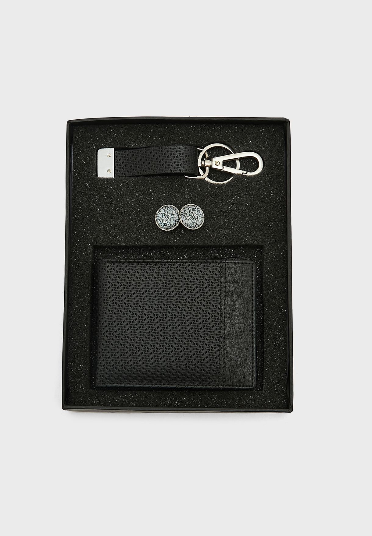 مجموعة هدايا من محفظة وحمالة مفاتيح وازرار اساور قميص