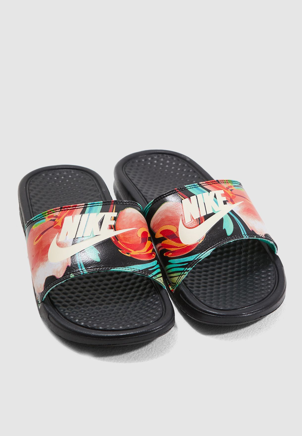 multi colored nike slides