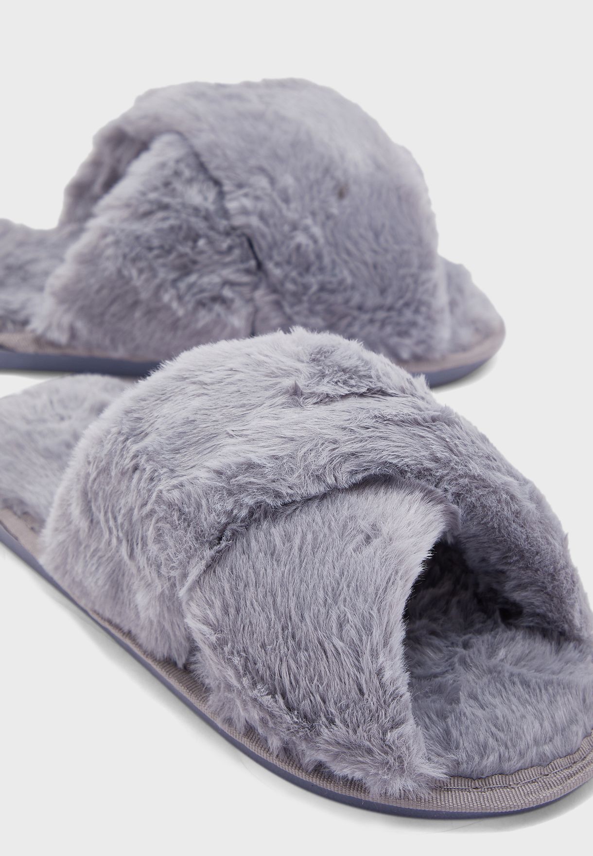 grey fluffy cross over slippers