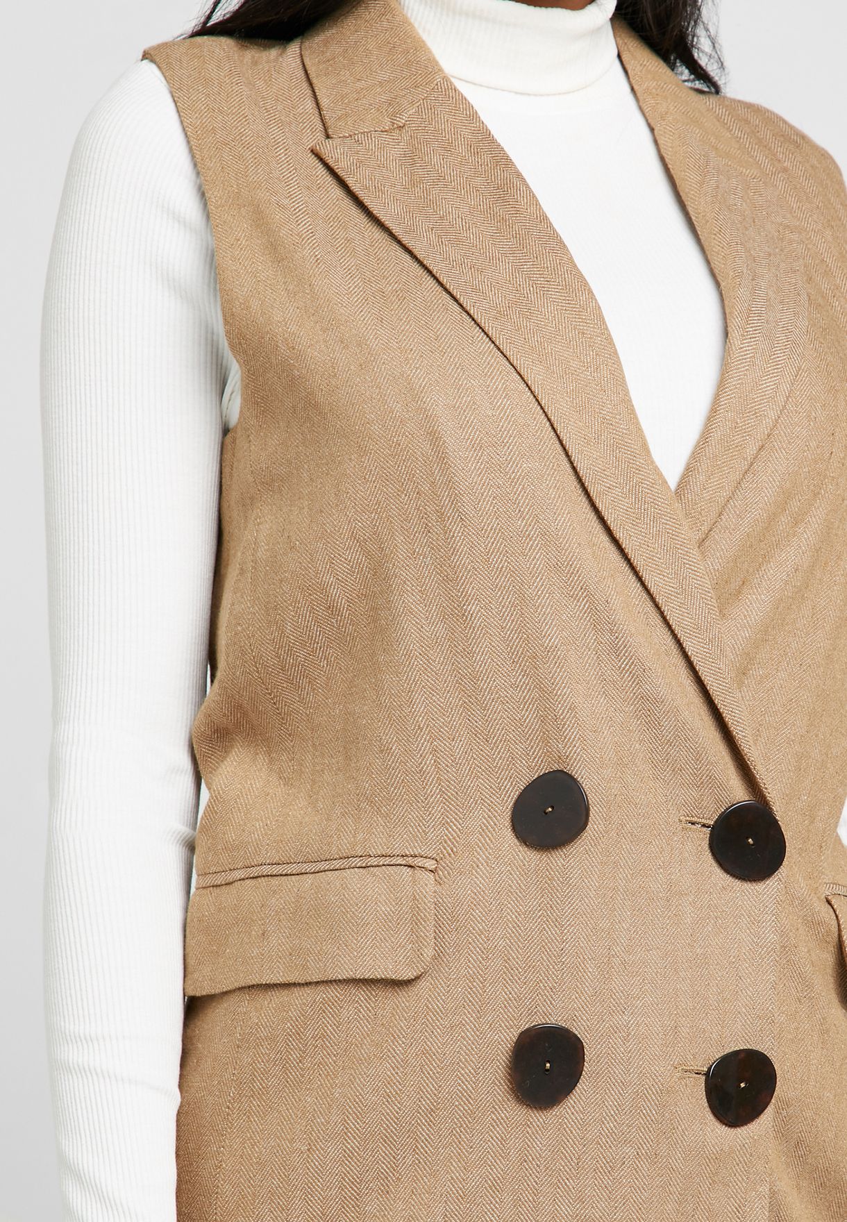 mango sleeveless coat