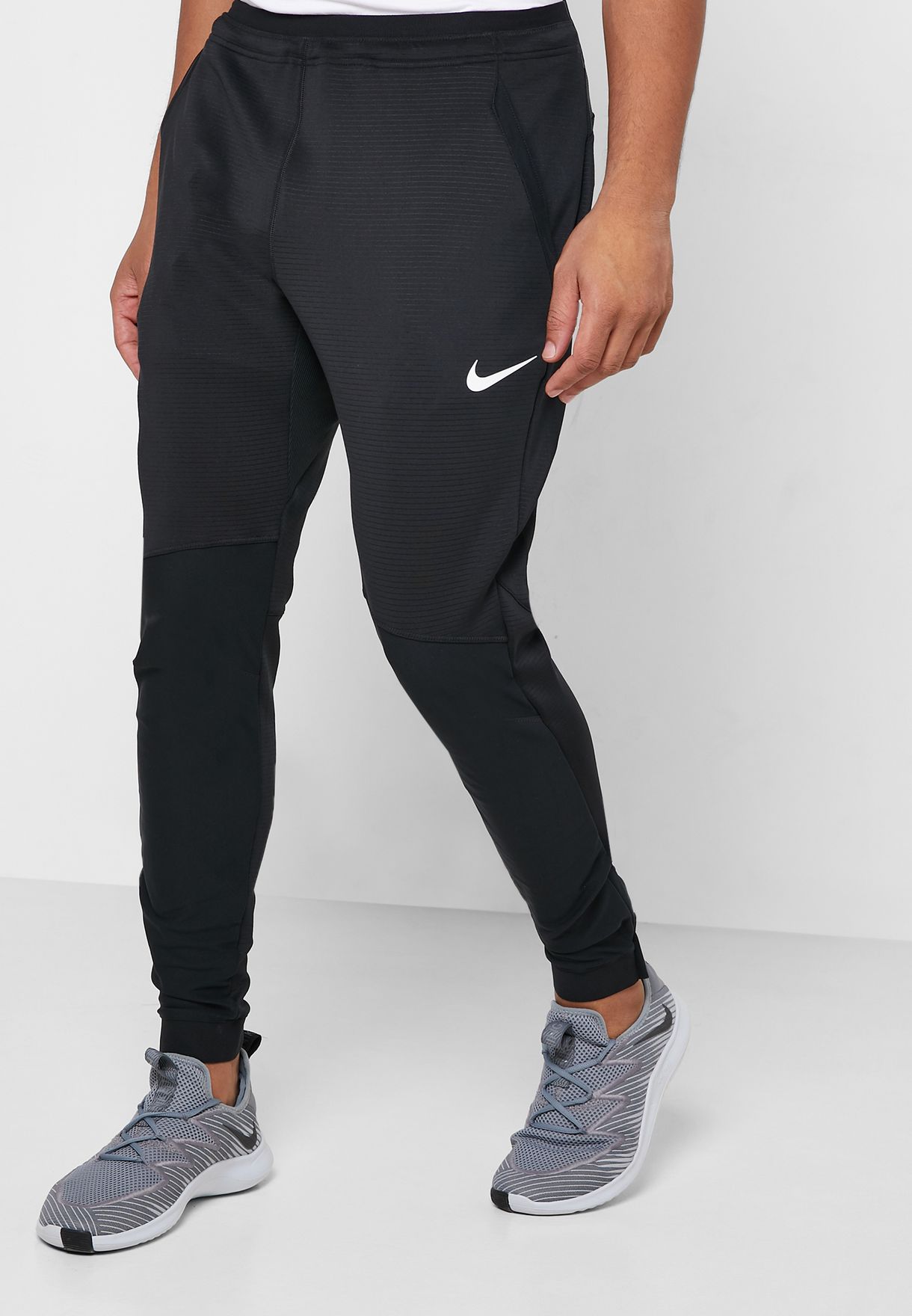 Buy Nike black NPC Sweatpants for Men 
