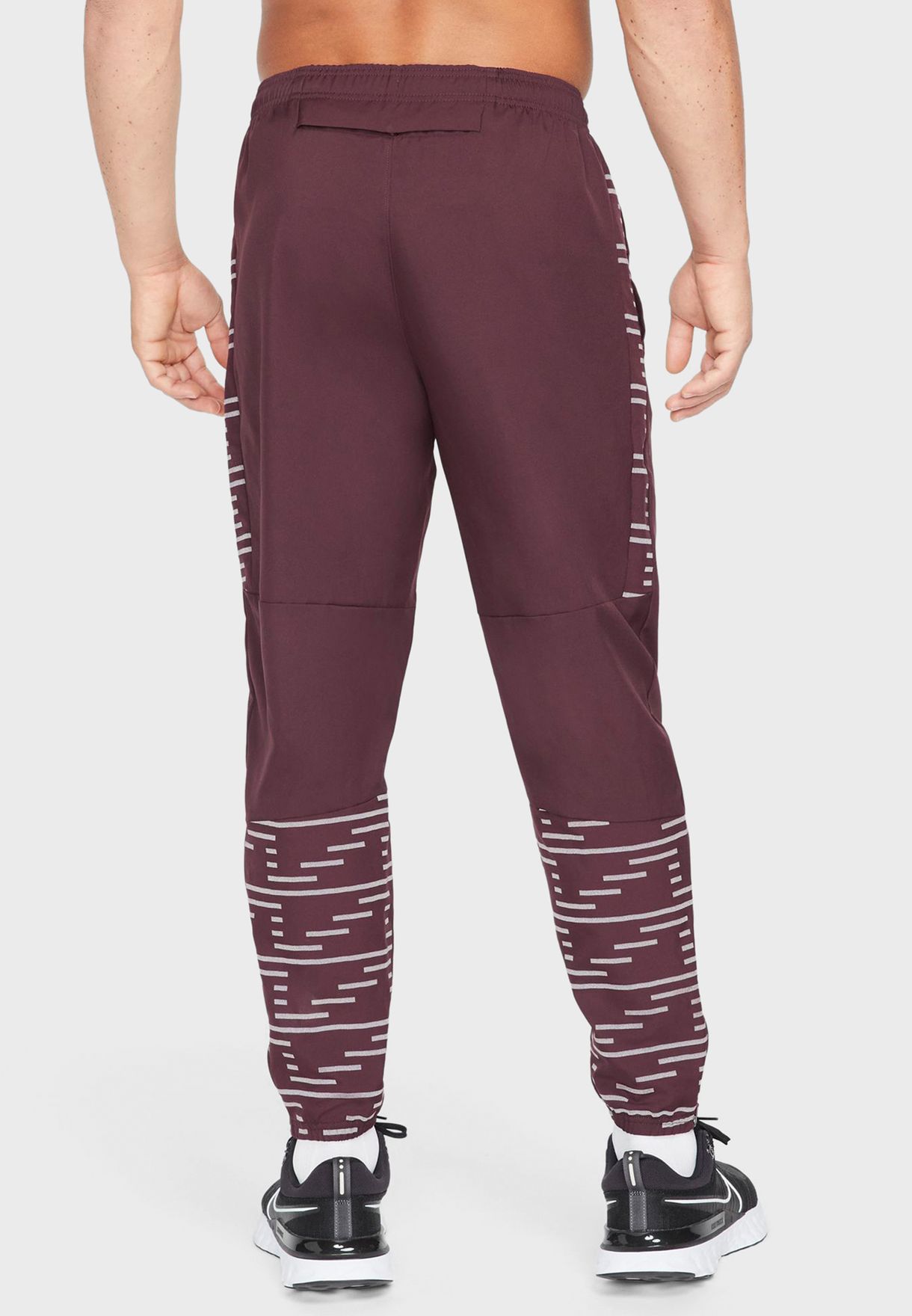 nike dri fit challenger woven pants