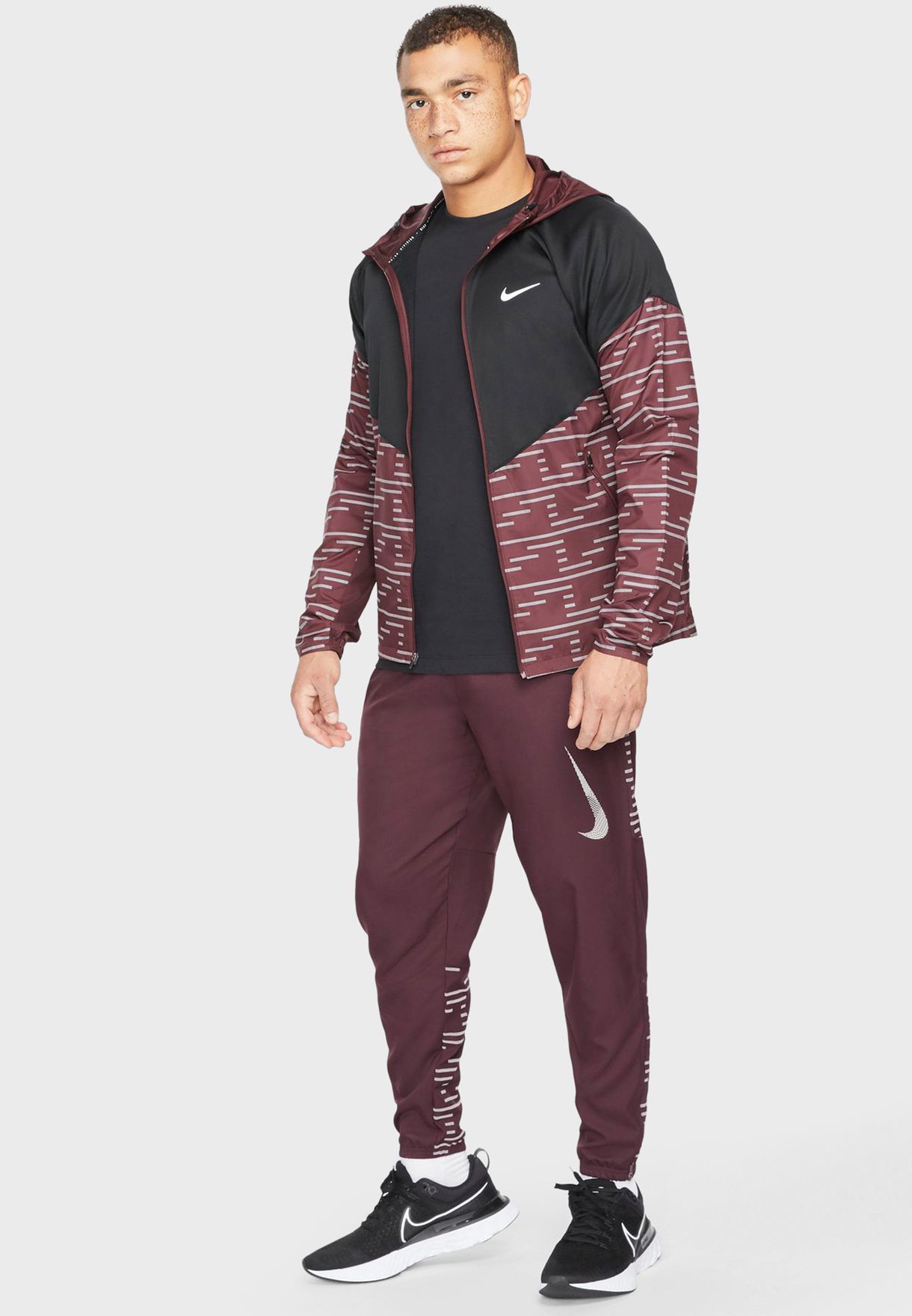 nike dri fit challenger woven