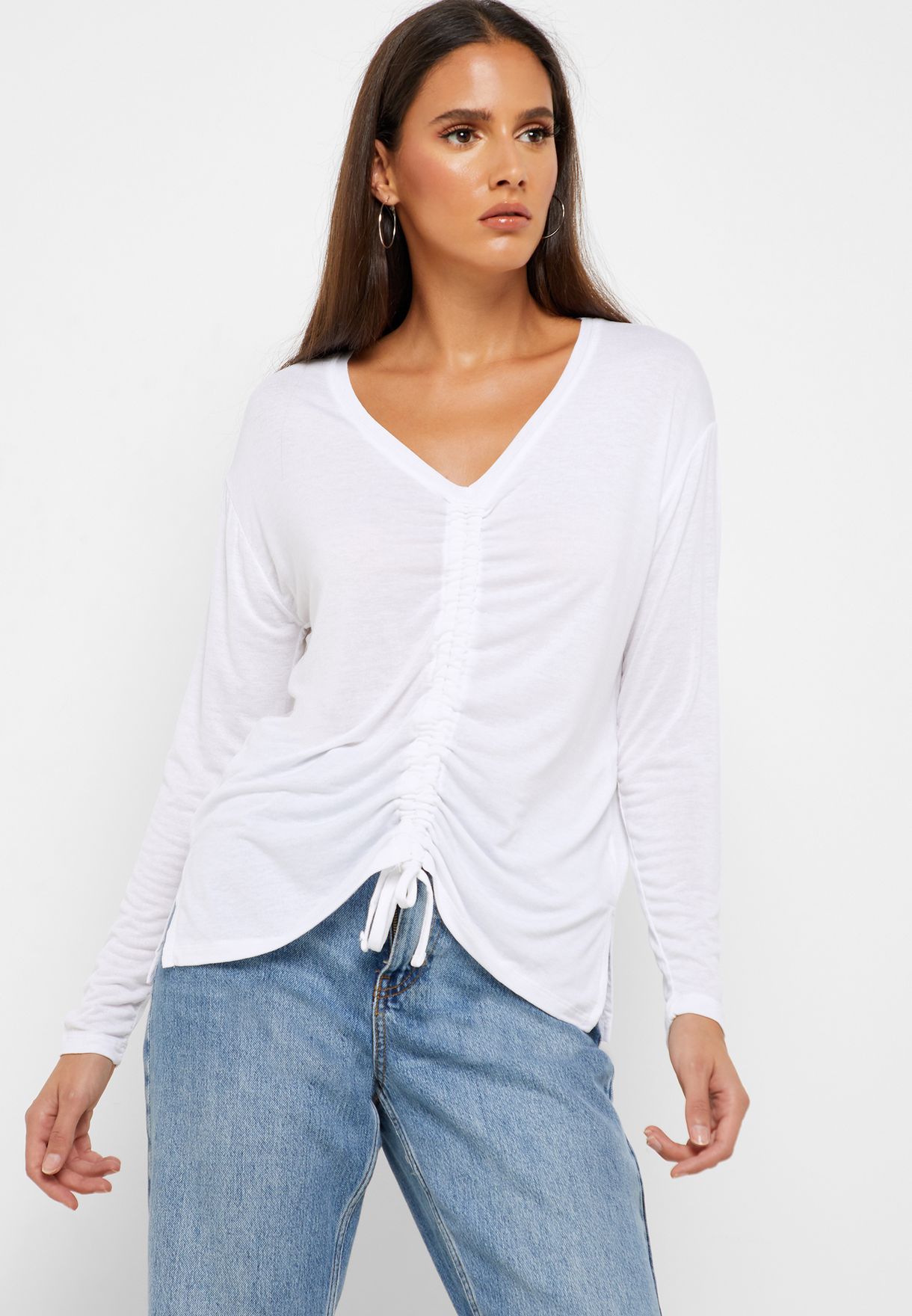 white ruched long sleeve top