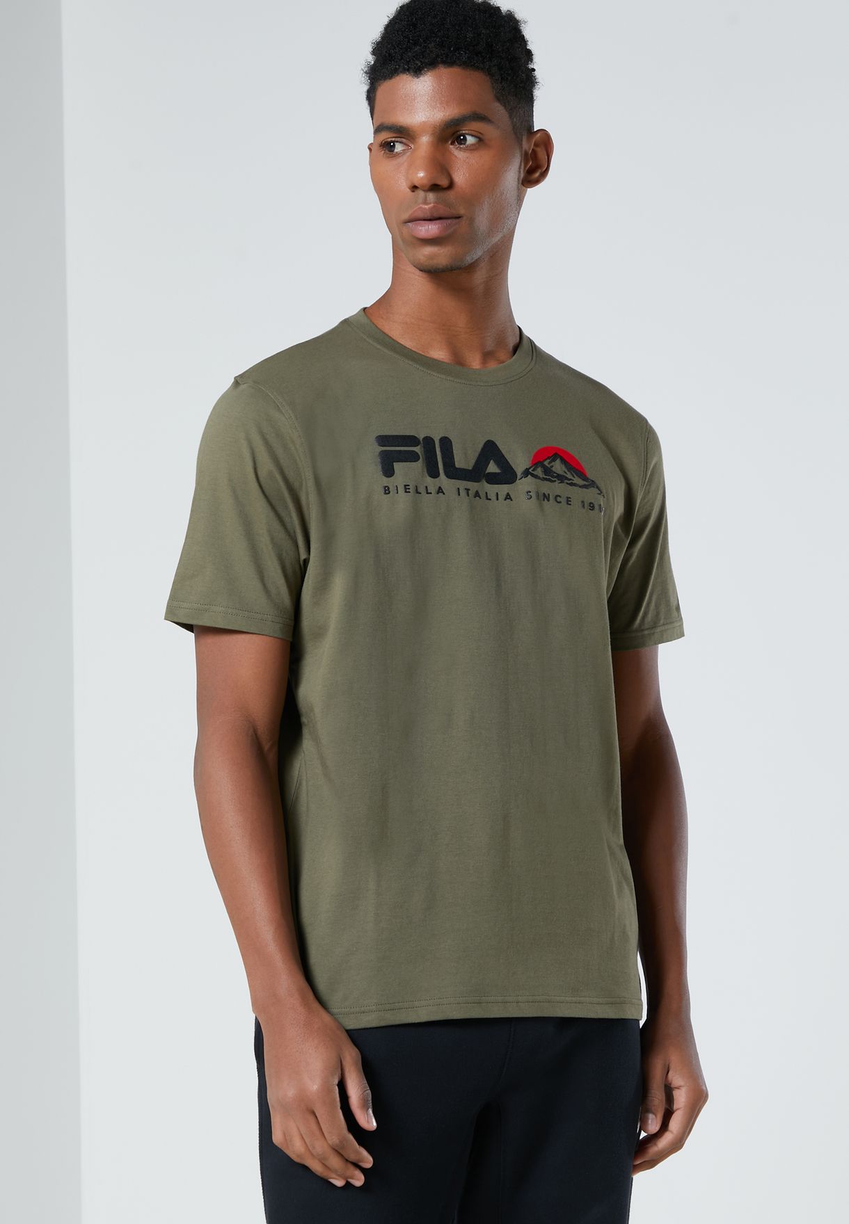 brown fila shirt