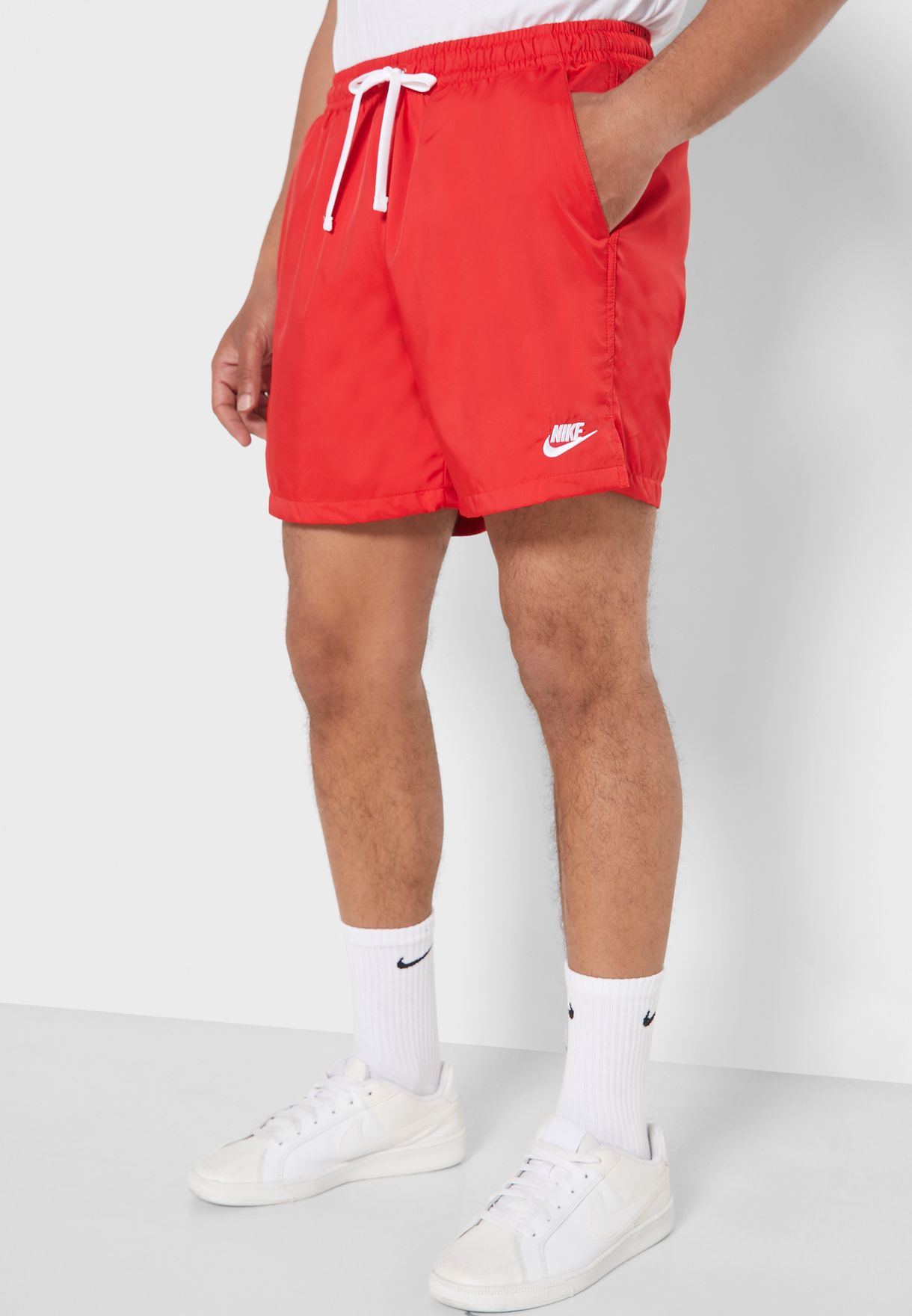 Buy Nike red NSW Flow Shorts for Men in 