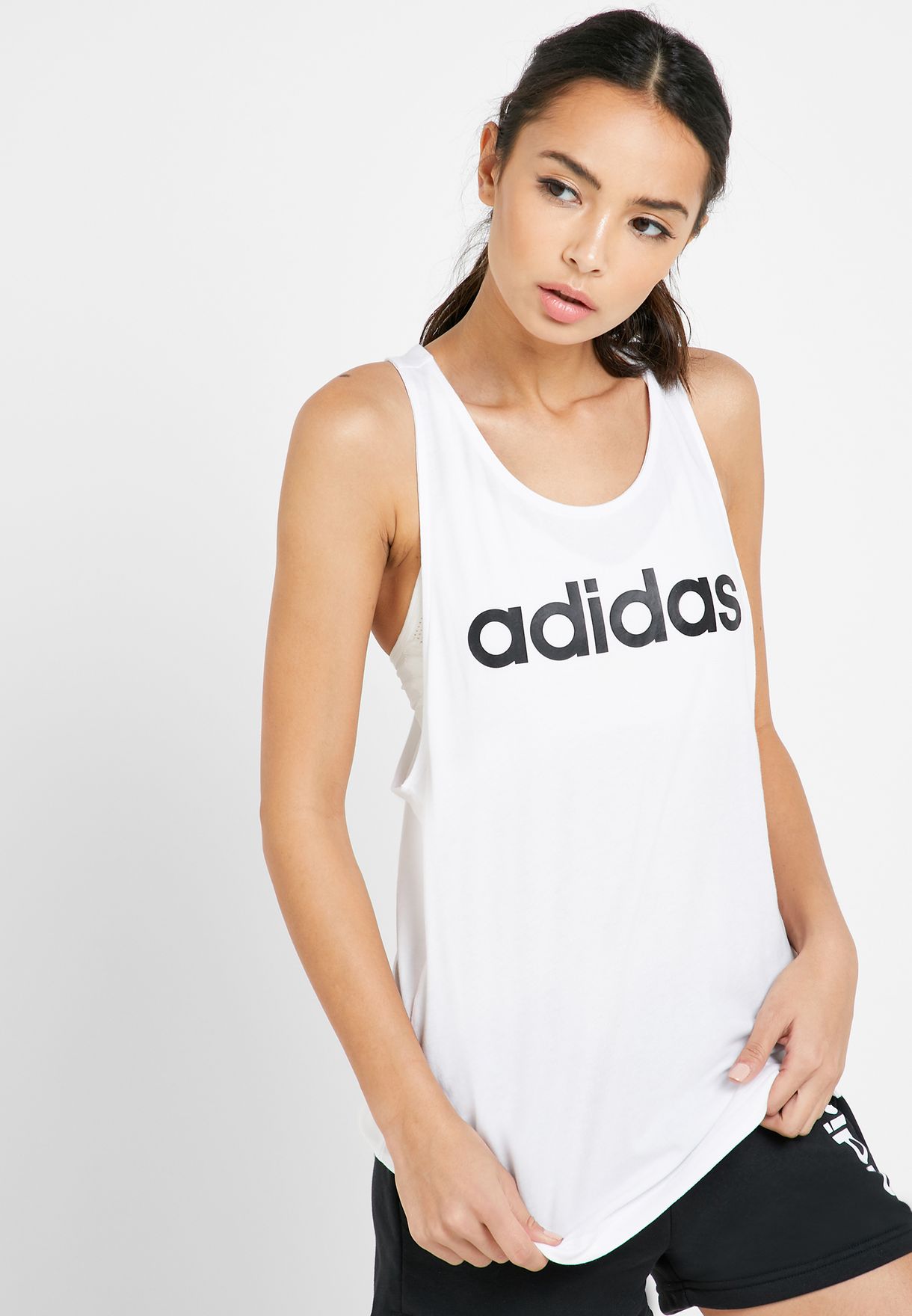 Buy adidas white Essential Linear Loose Tank for Women in MENA,