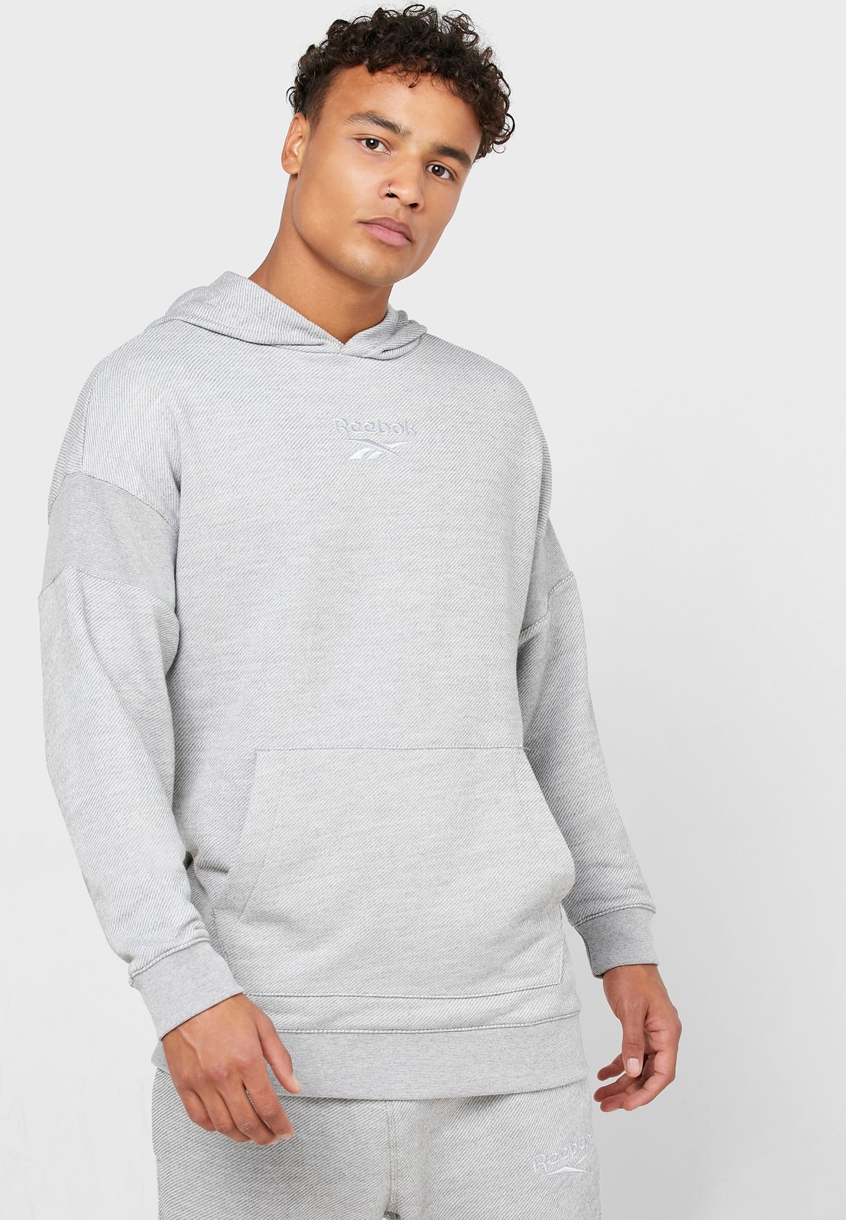 Buy Reebok grey Training Essential Melange Hoodie for Men ...