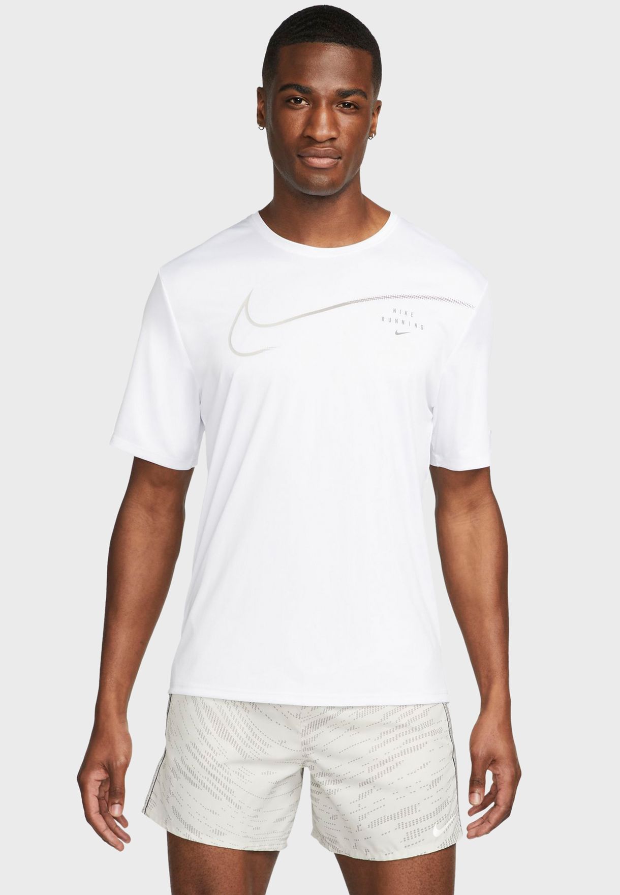 Buy Nike white Dri-Fit Uv Run Dvn Miler Graphic T-Shirt for Kids in ...