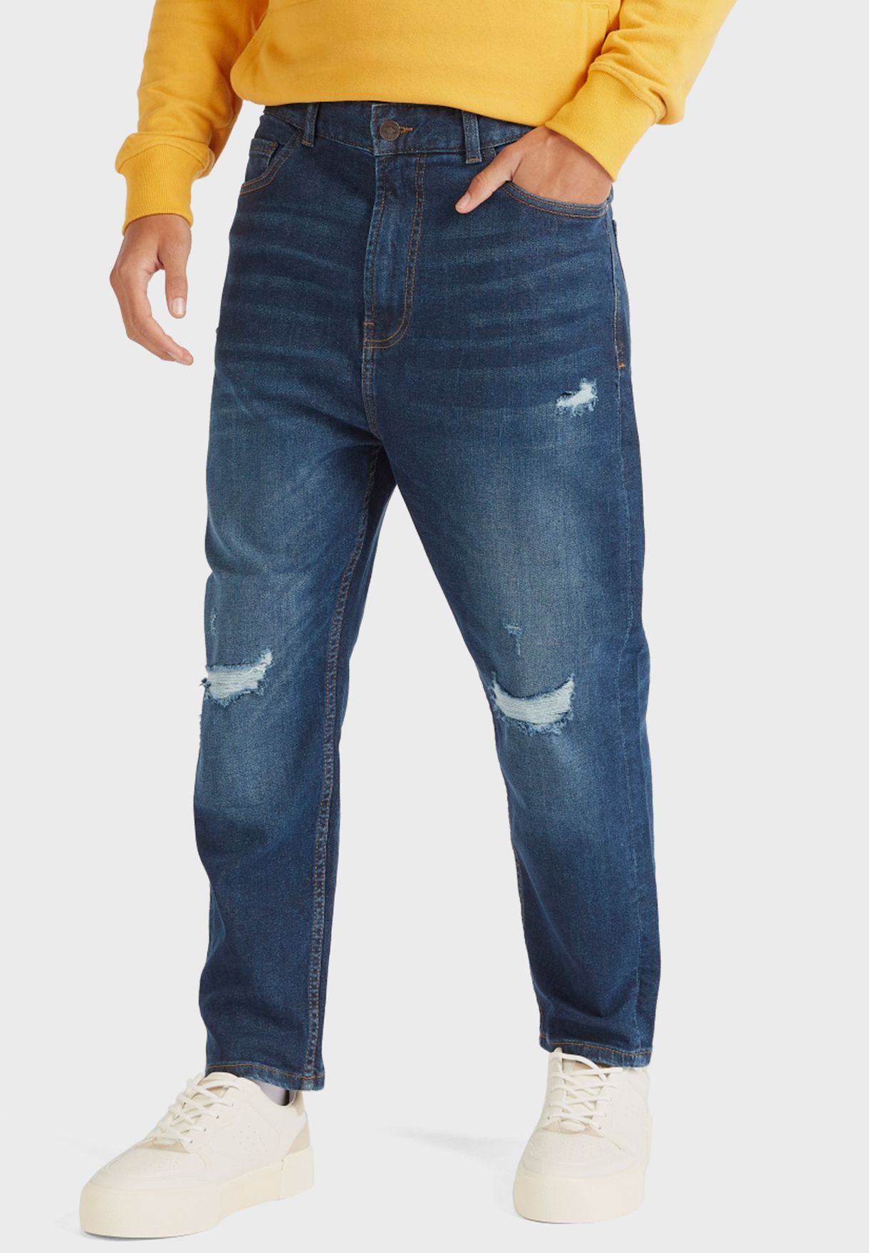 Tapered Mid Wash Jeans