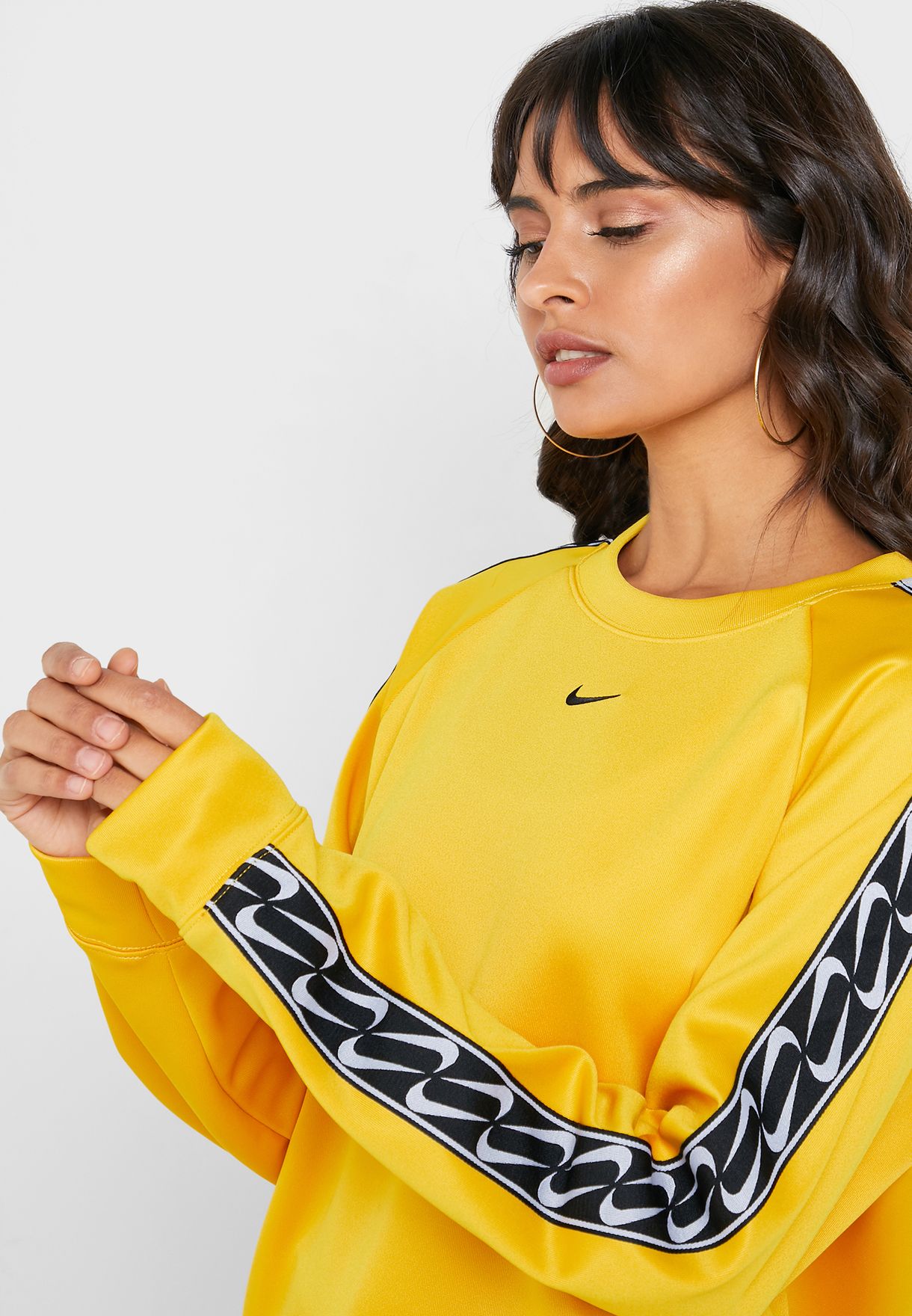 Buy Nike yellow NSW Logo Tape T-Shirt for Women in MENA, Worldwide