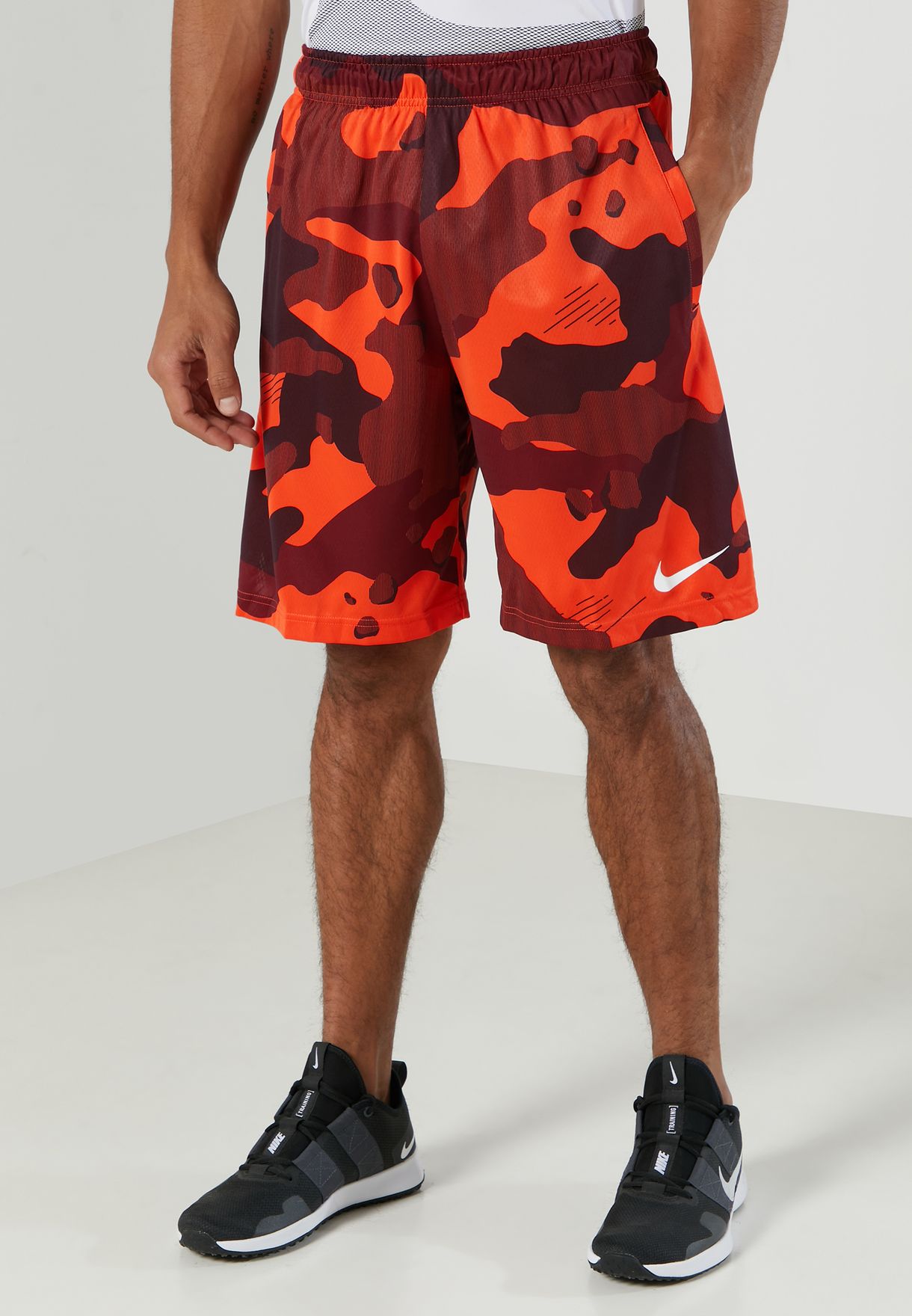 men orange nike shorts