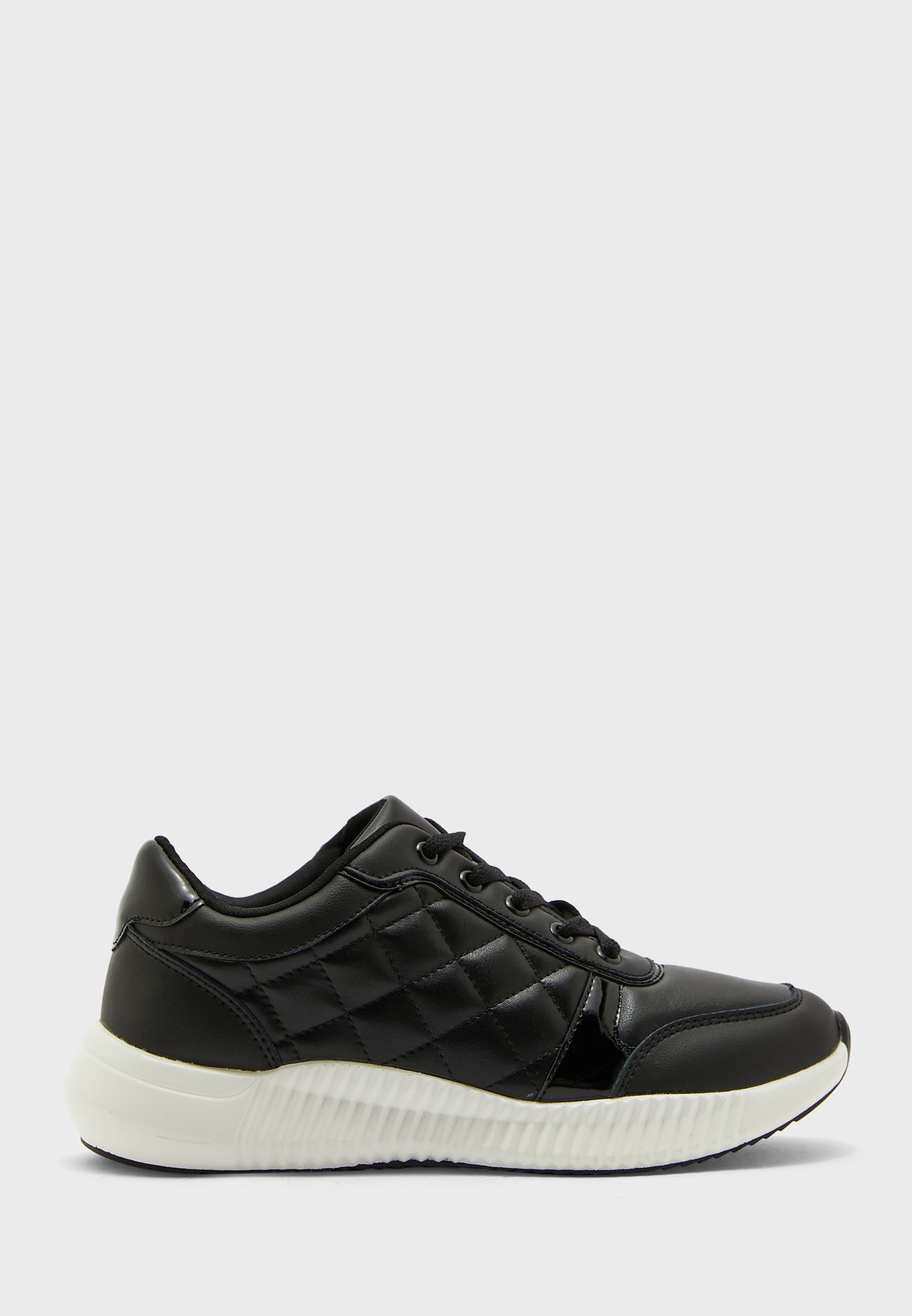 black quilted sneakers