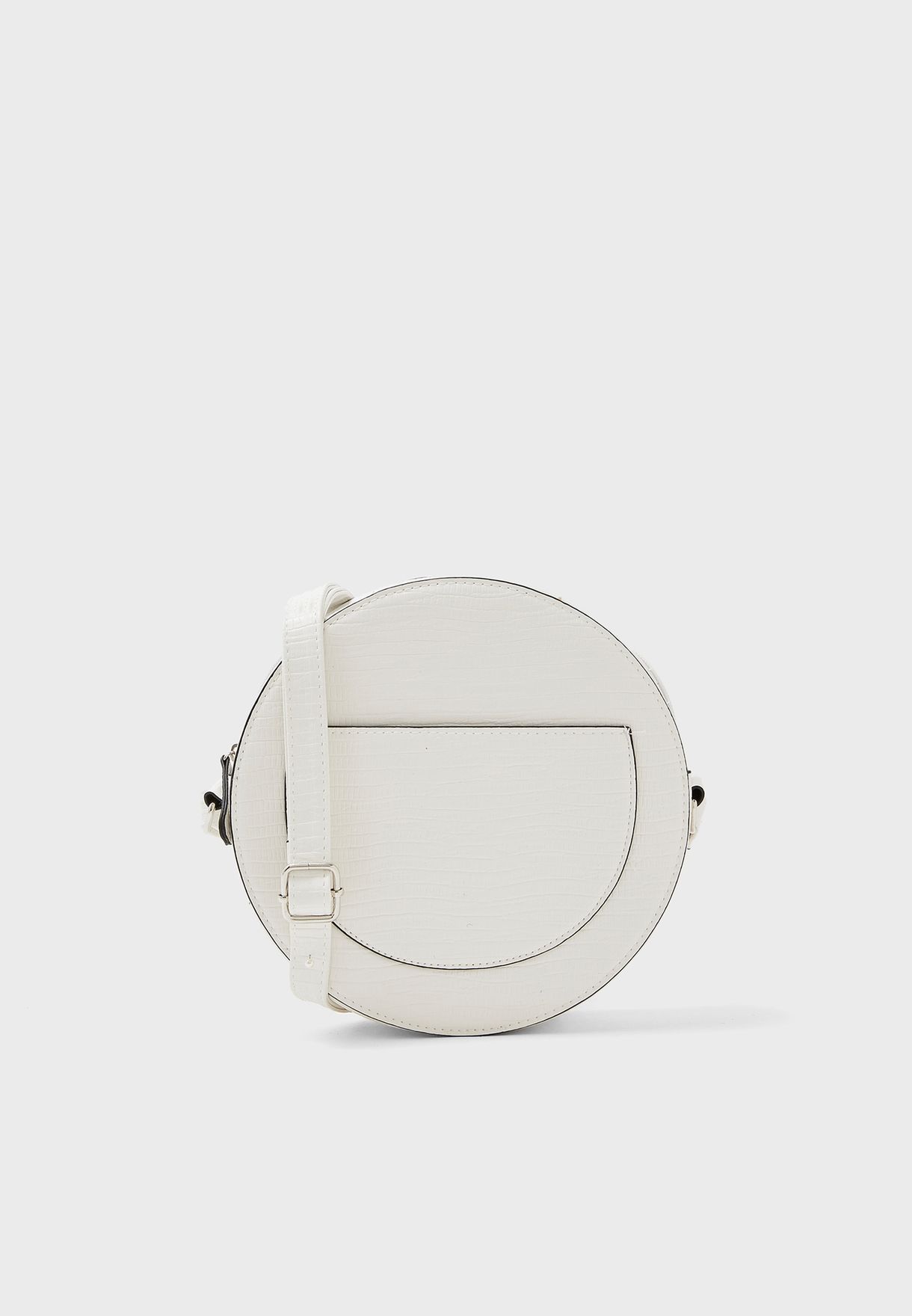 white round crossbody bag