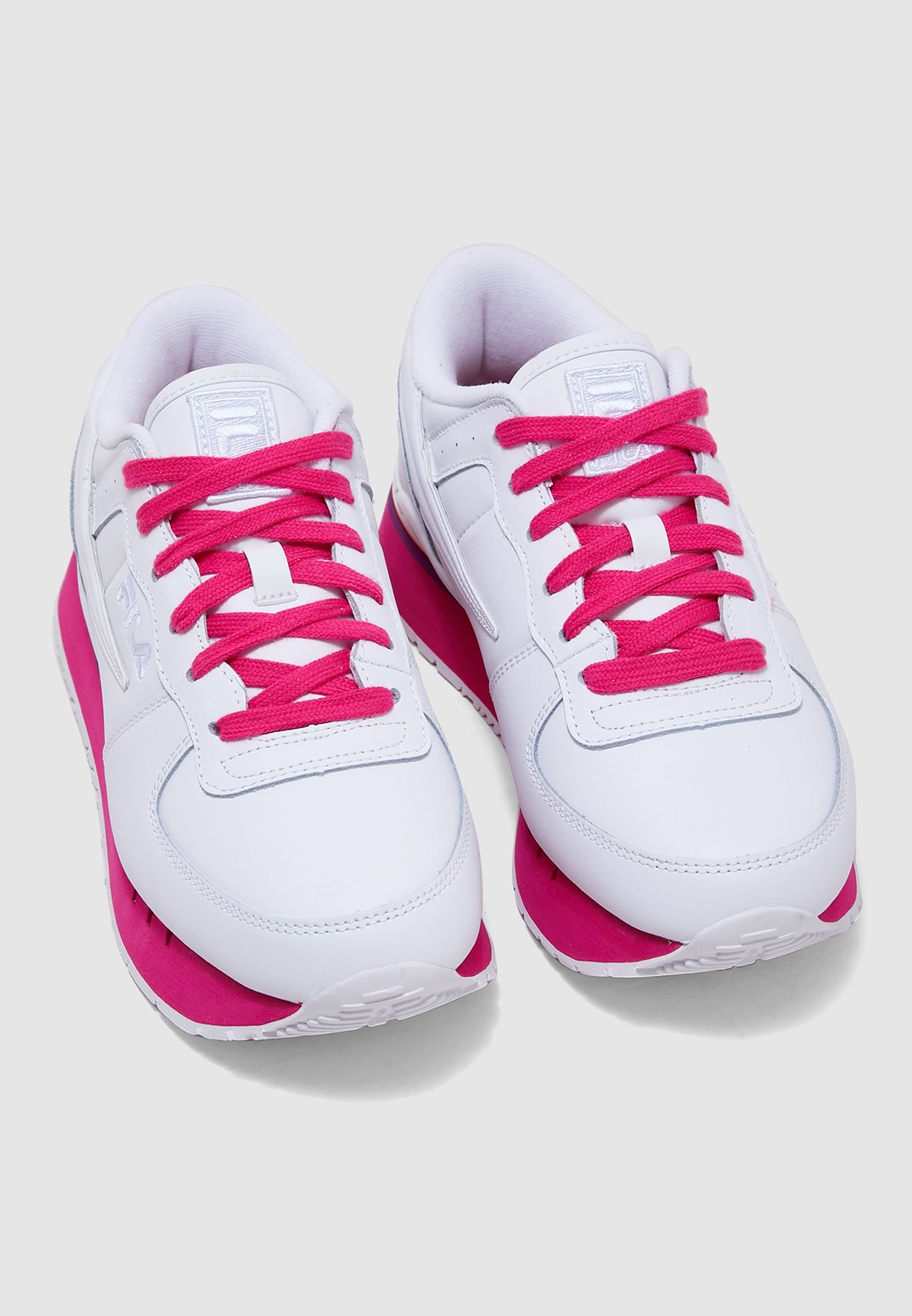 fila pink and white trainers