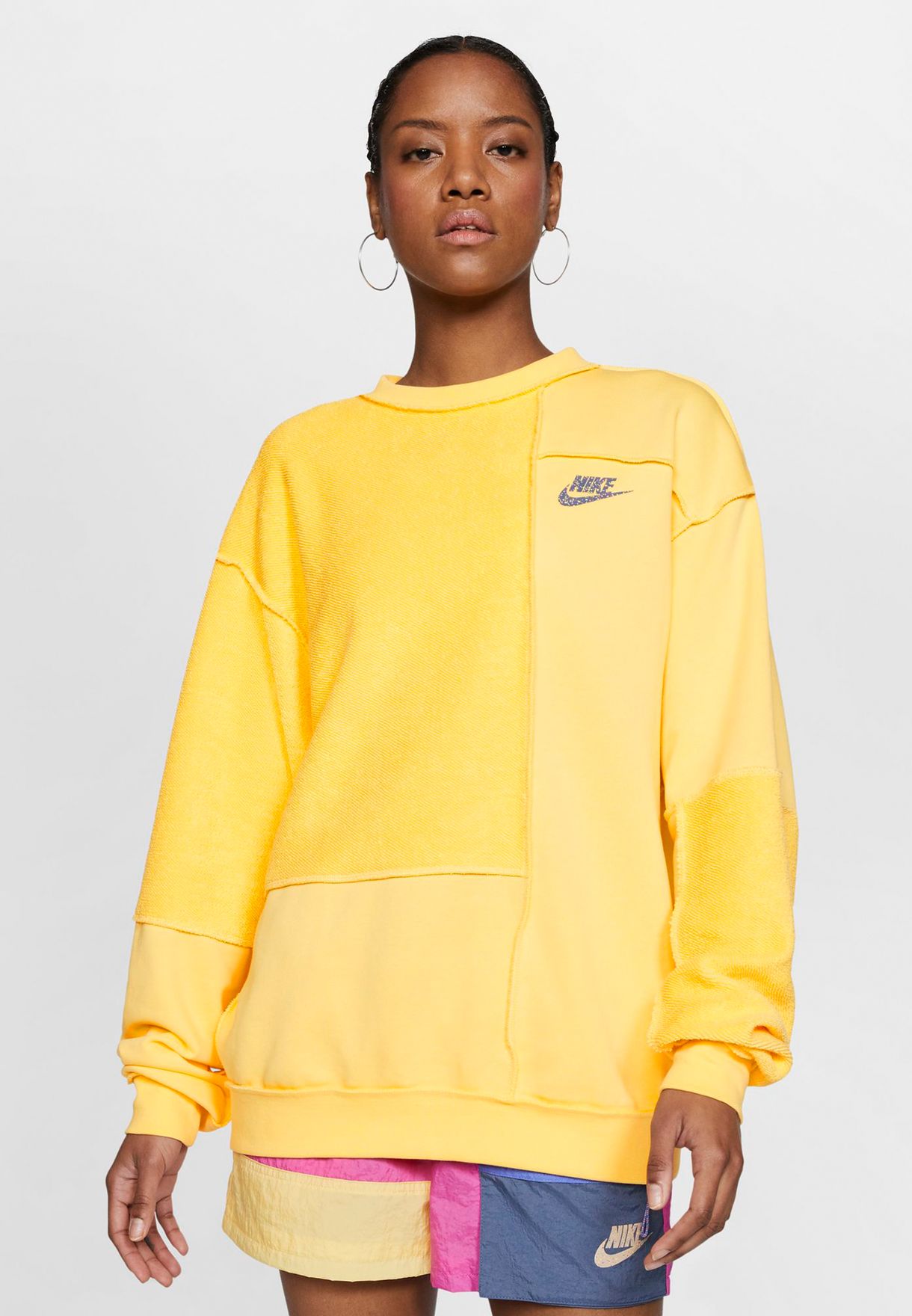 Buy Nike yellow NSW Icon Clash Fleece 