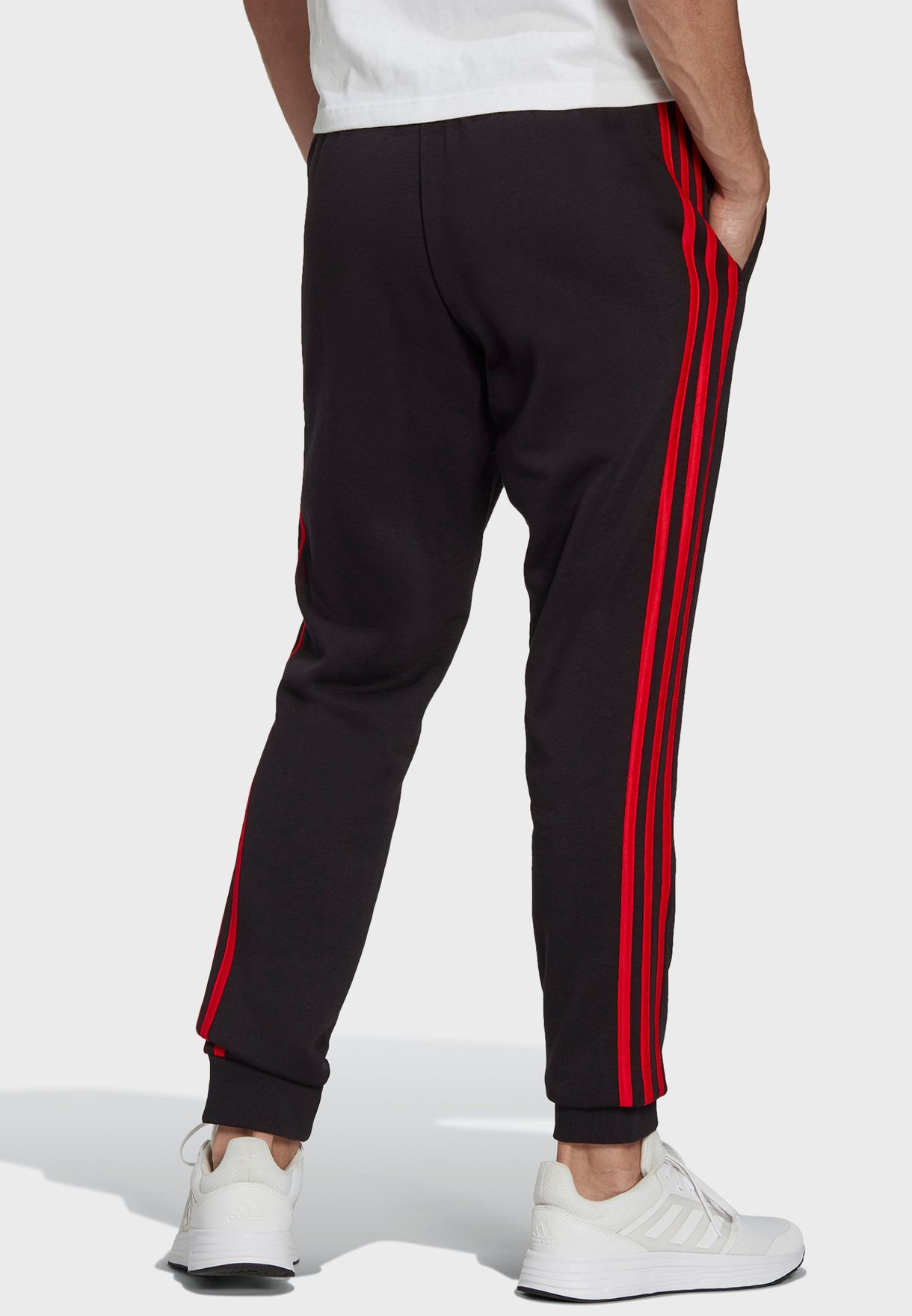 Buy adidas black Essentials Tapered Cuffed 3 Stripes Sweatpants for ...