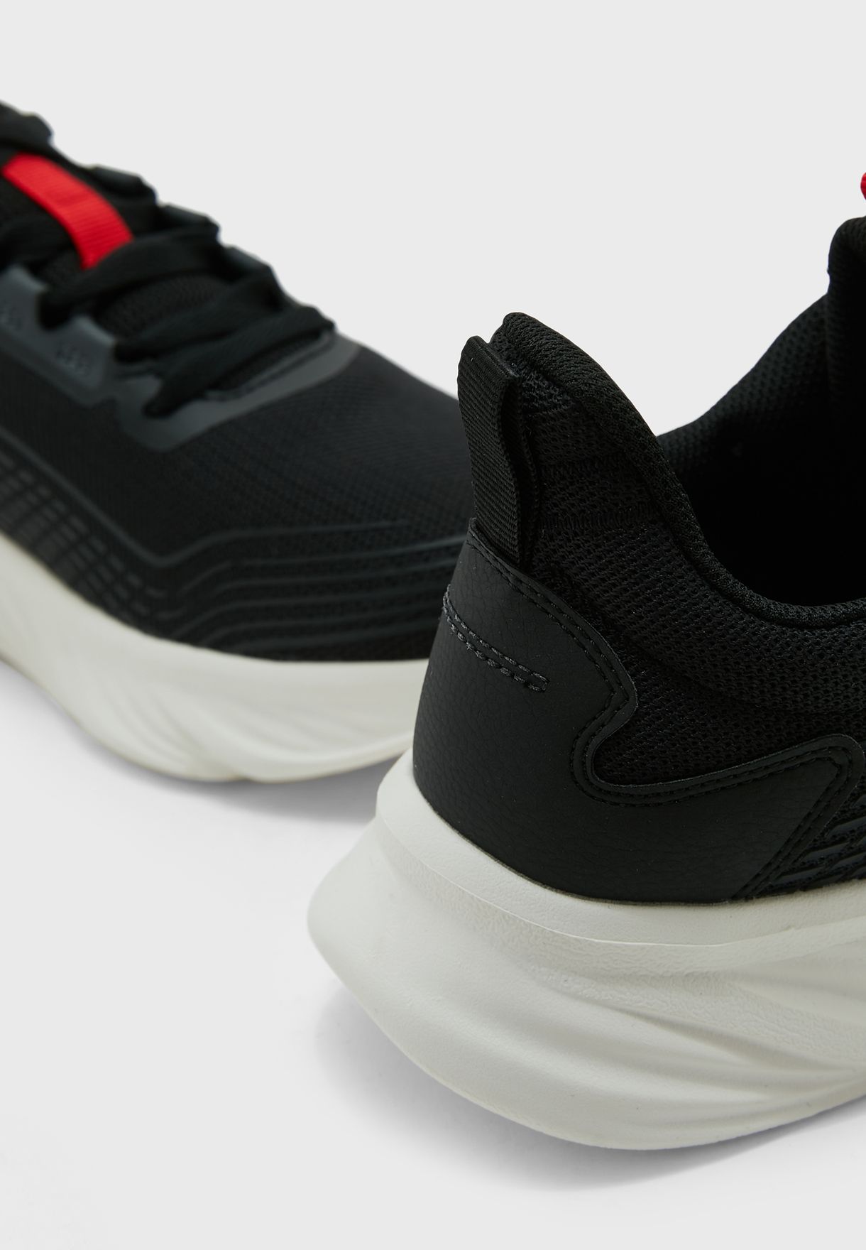 anta running shoes black