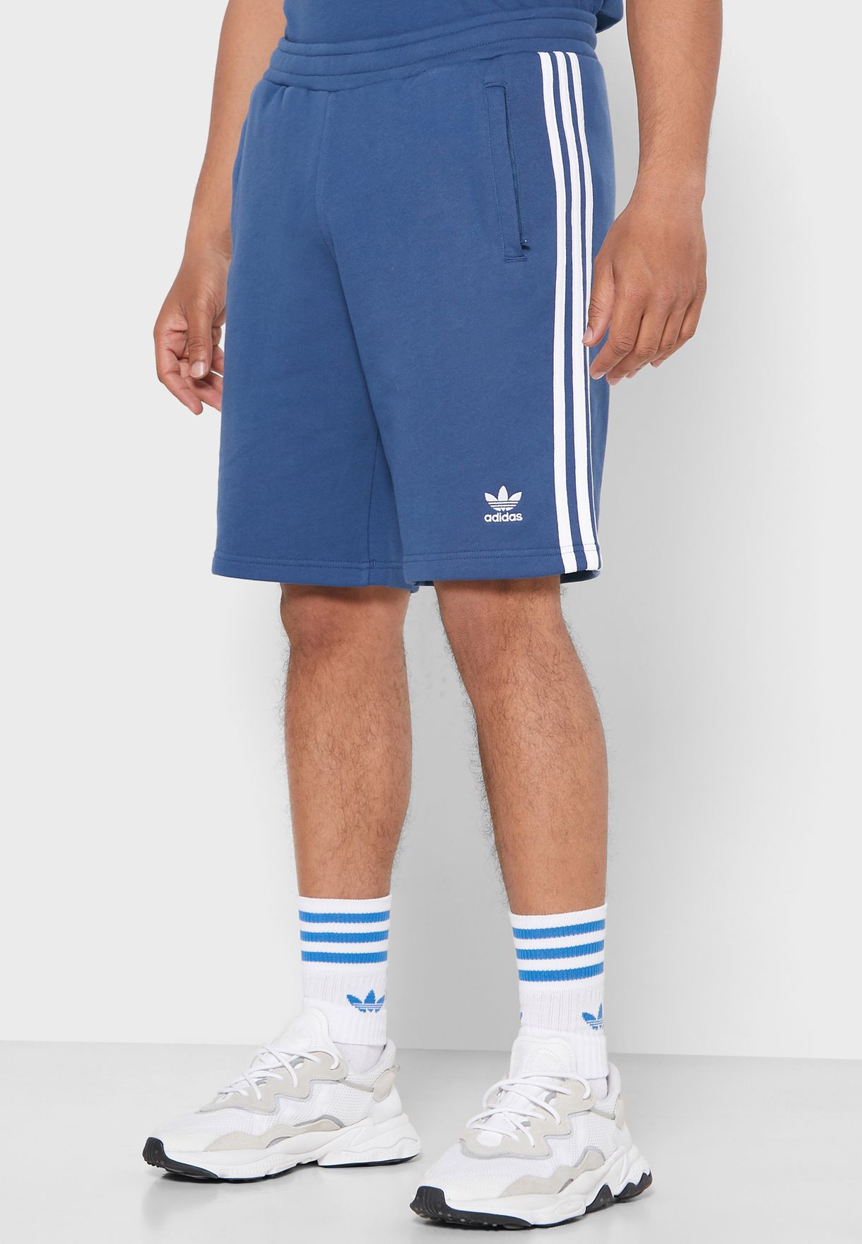 blue adidas three stripe shorts