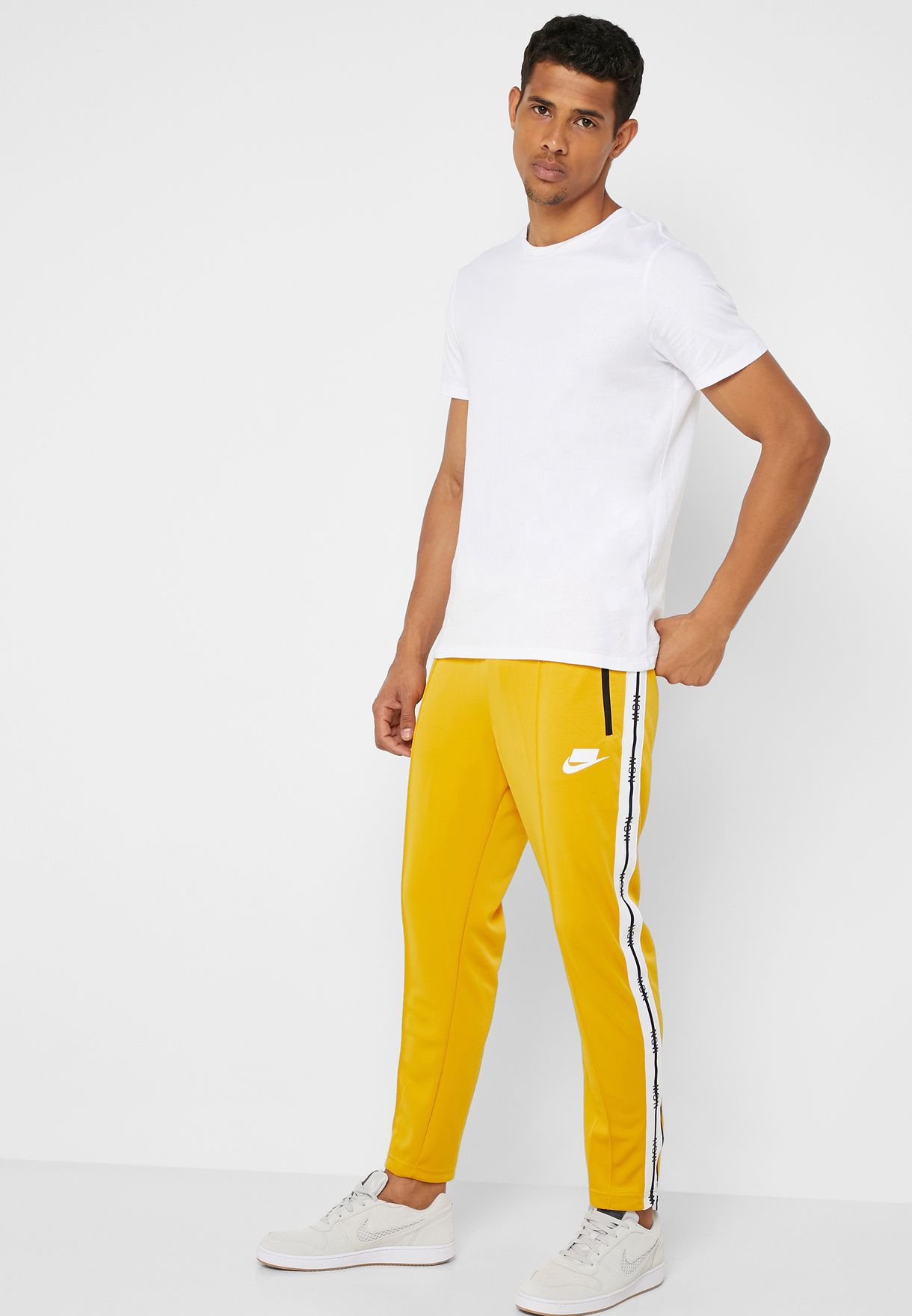 Buy Nike yellow NSW Sweatpants for Men 