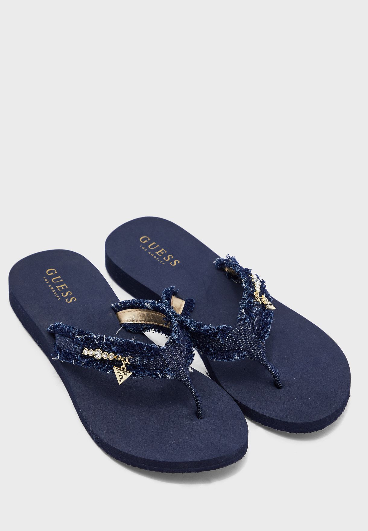 guess navy blue flip flops